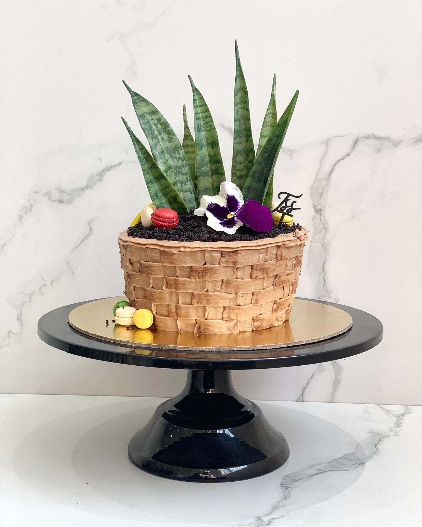 Fresh floral cakes from The Sinful Spoon with colorful, intricately decorated floral icing and elegant cake design.