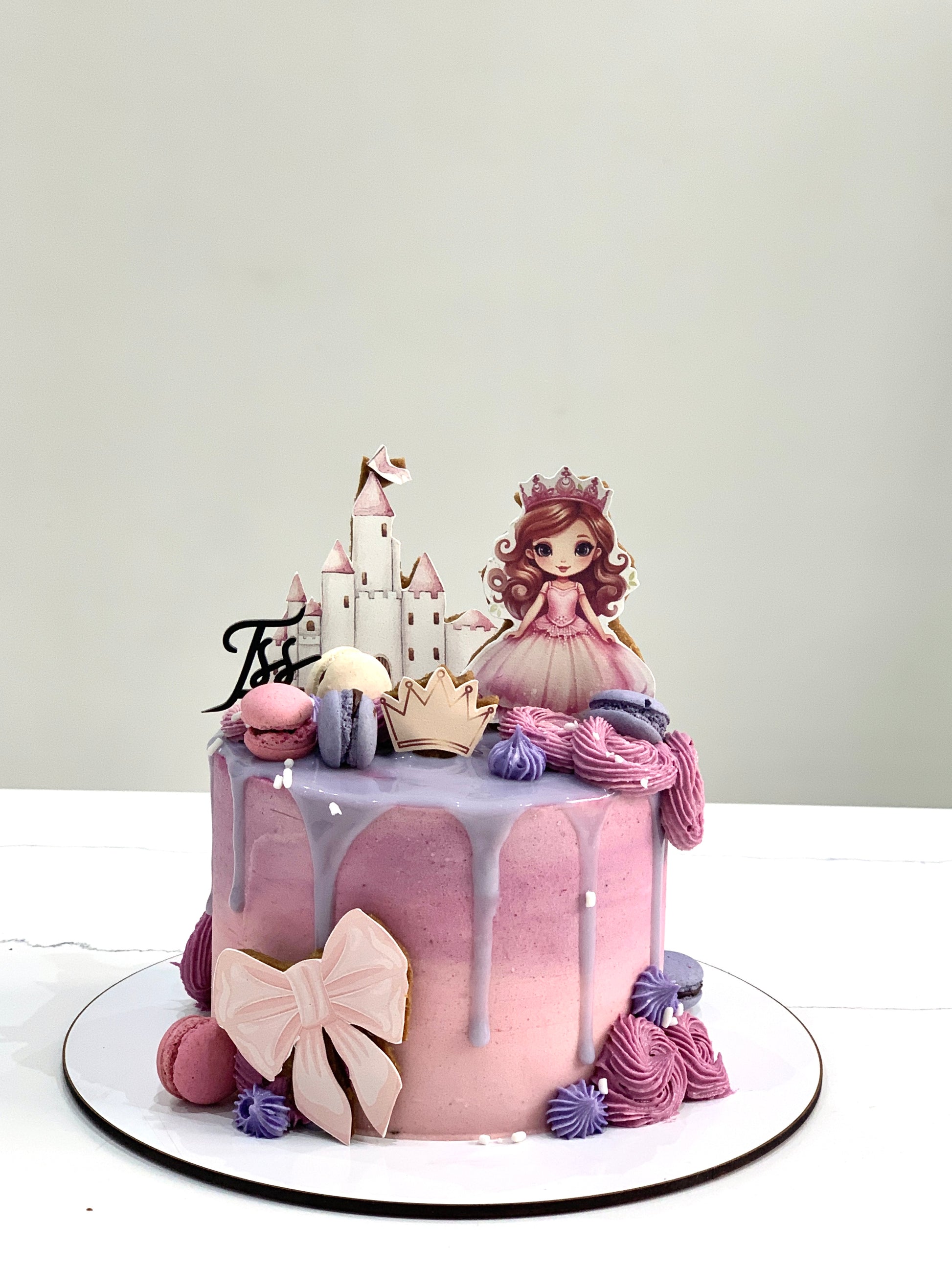 Edible paper cake topper featuring a baby girl design from The Sinful Spoon for cake decorating.