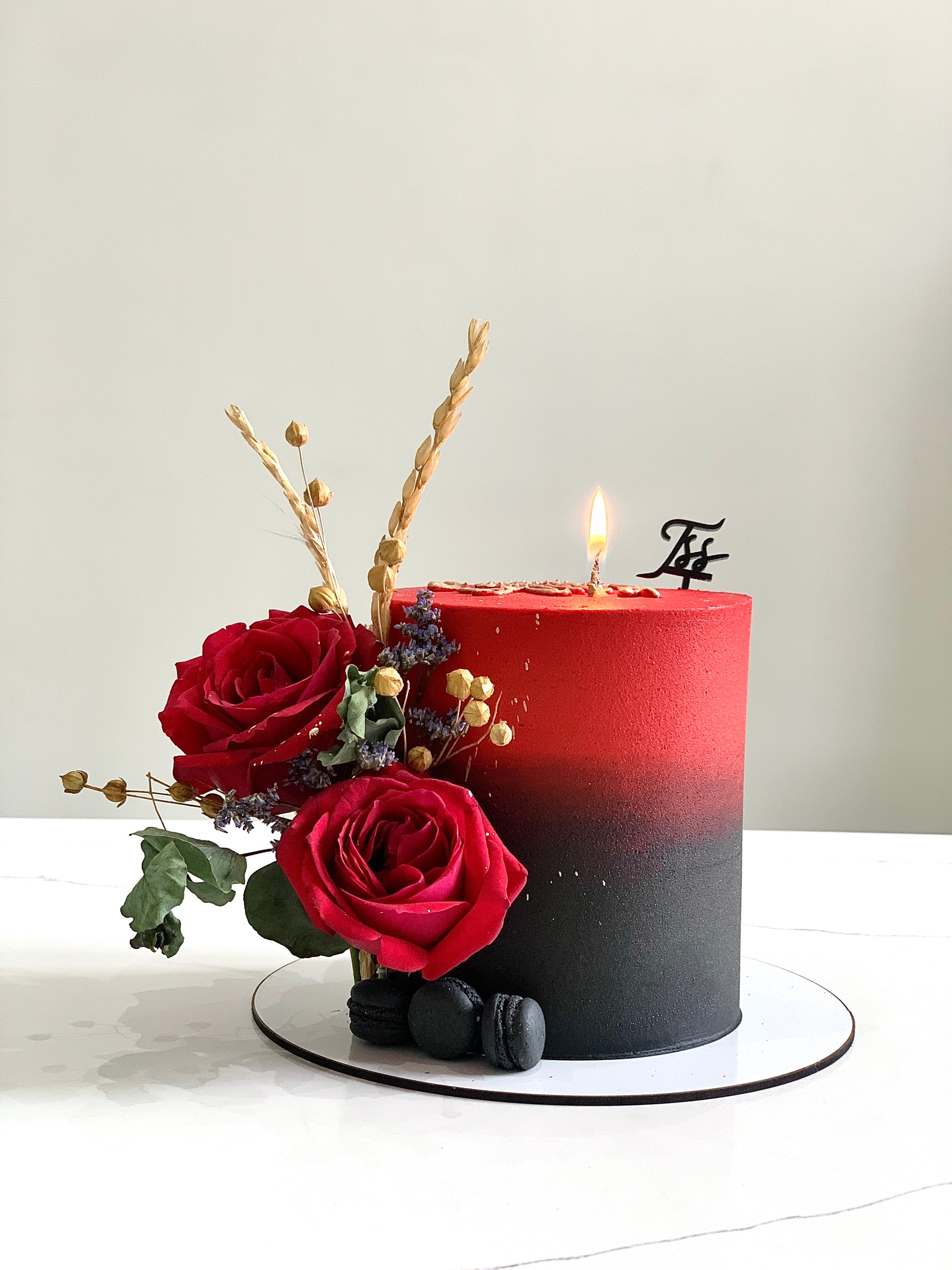 Fresh floral cakes from The Sinful Spoon featuring colorful icing, edible flowers, and intricate decorative details.