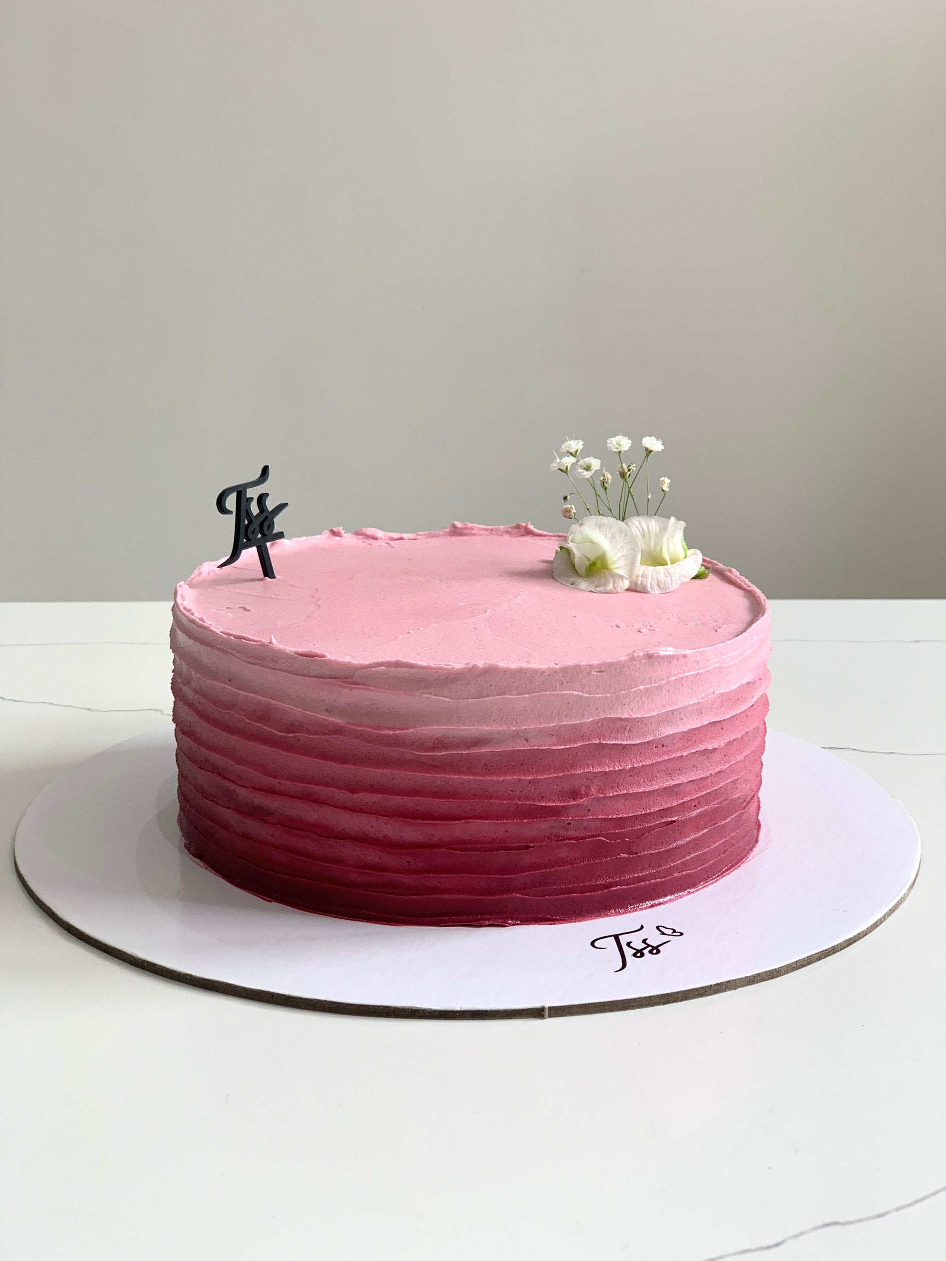 Image of Classic Cakes by The Sinful Spoon, showcasing a variety of delicious, freshly baked cakes with colorful frosting and toppings.