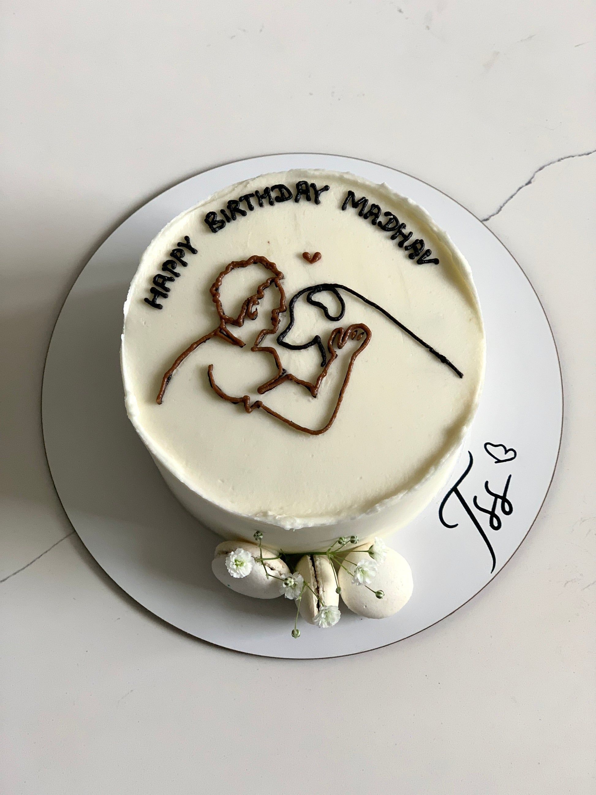 Buttercream illustration cake by The Sinful Spoon featuring colorful floral and whimsical designs on a decorated cake.