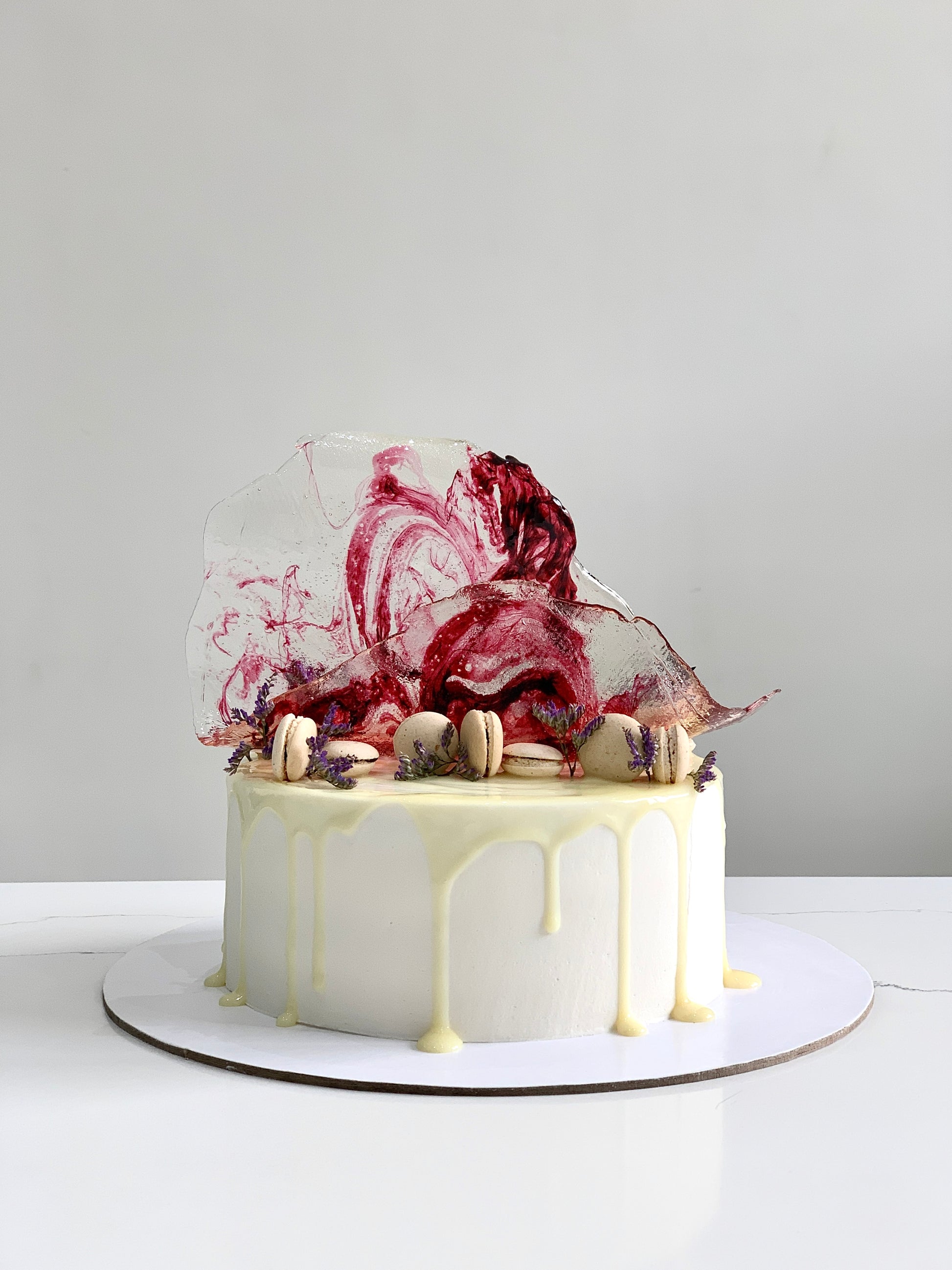 Isomalt cakes from The Sinful Spoon, colorful sugar art pieces for baking and confectionery decoration.