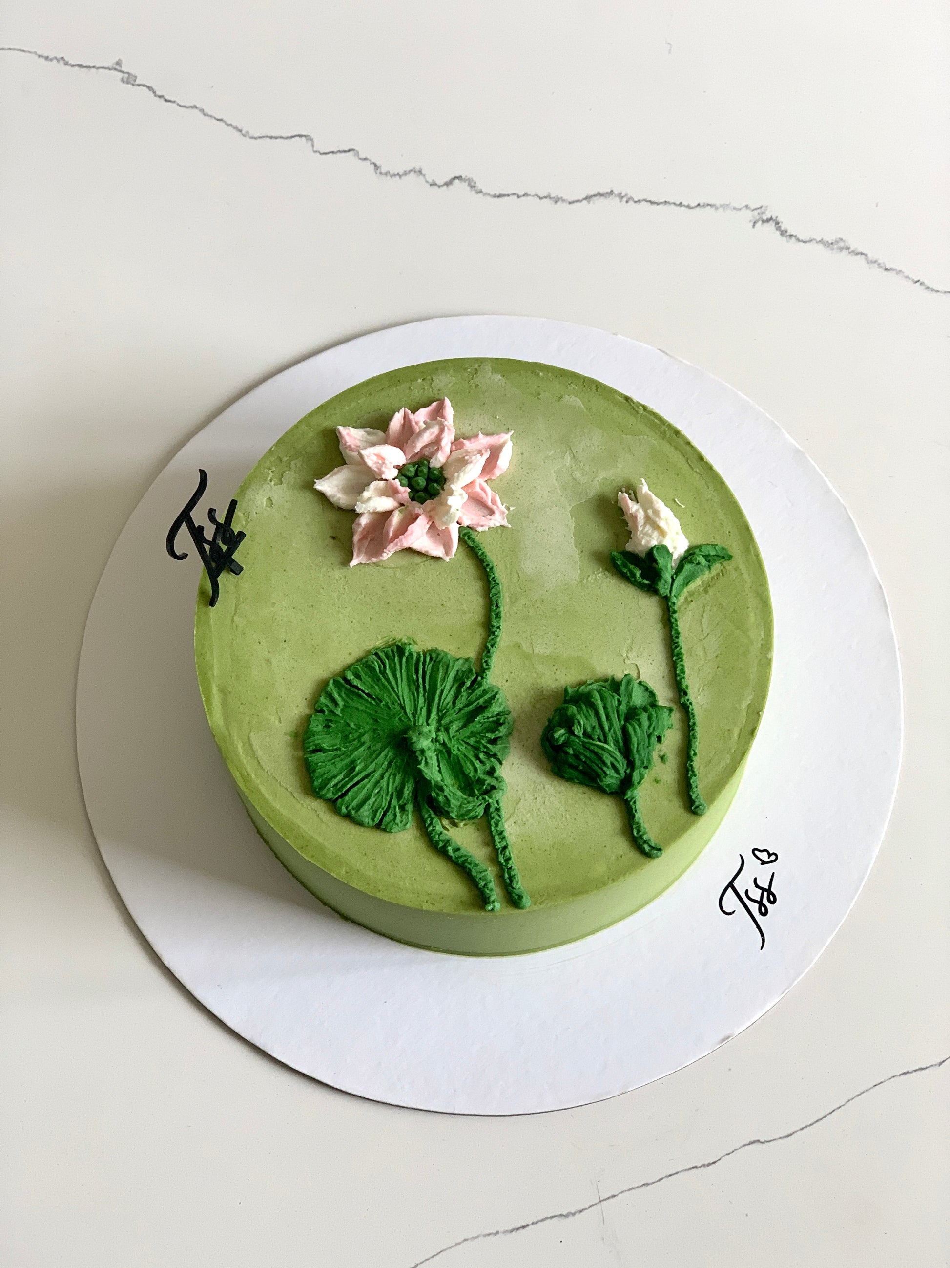 Decorative buttercream illustration cake by The Sinful Spoon featuring colorful floral and whimsical piping details.