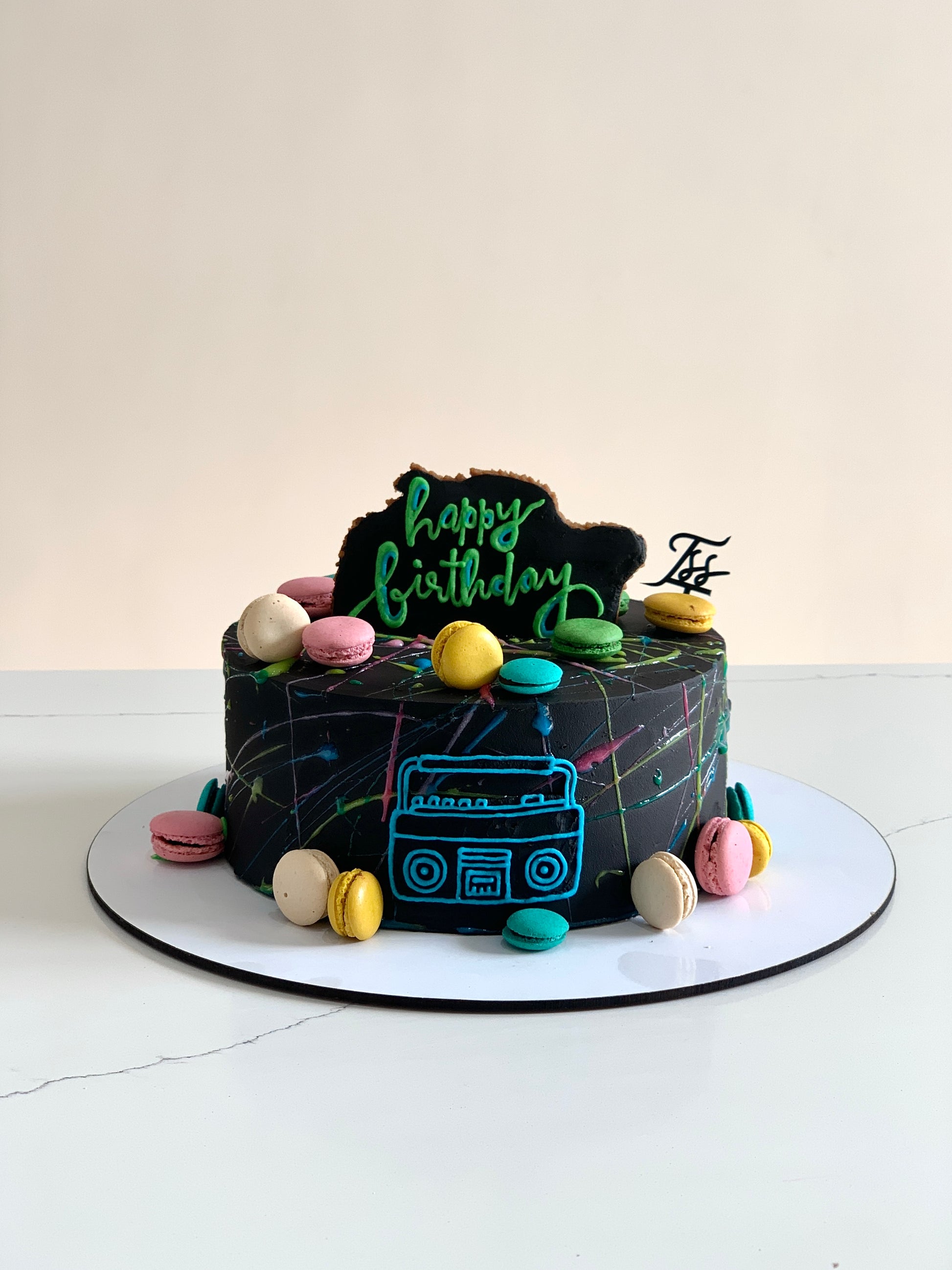 Edible paper cake for baby boy by The Sinful Spoon, featuring colorful baby-themed decorations and intricate edible design.