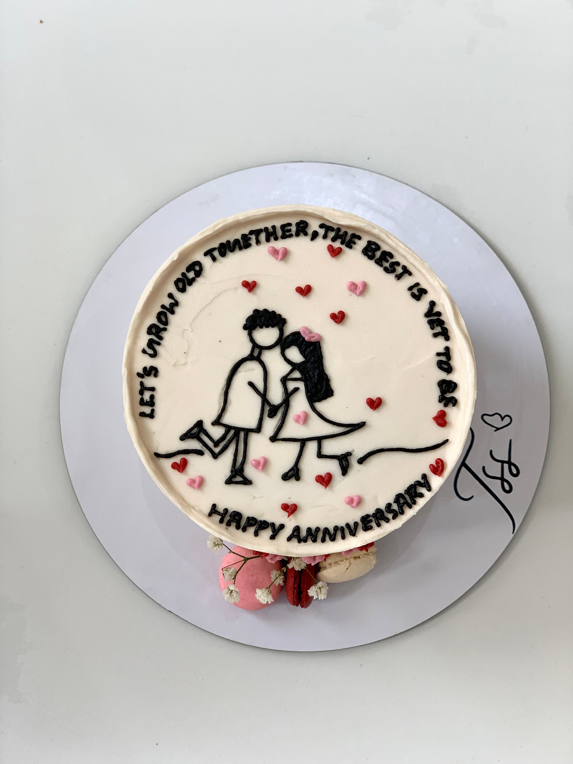 Valentine's Day cakes from The Sinful Spoon featuring decorated heart-shaped designs and vibrant red and pink icing.