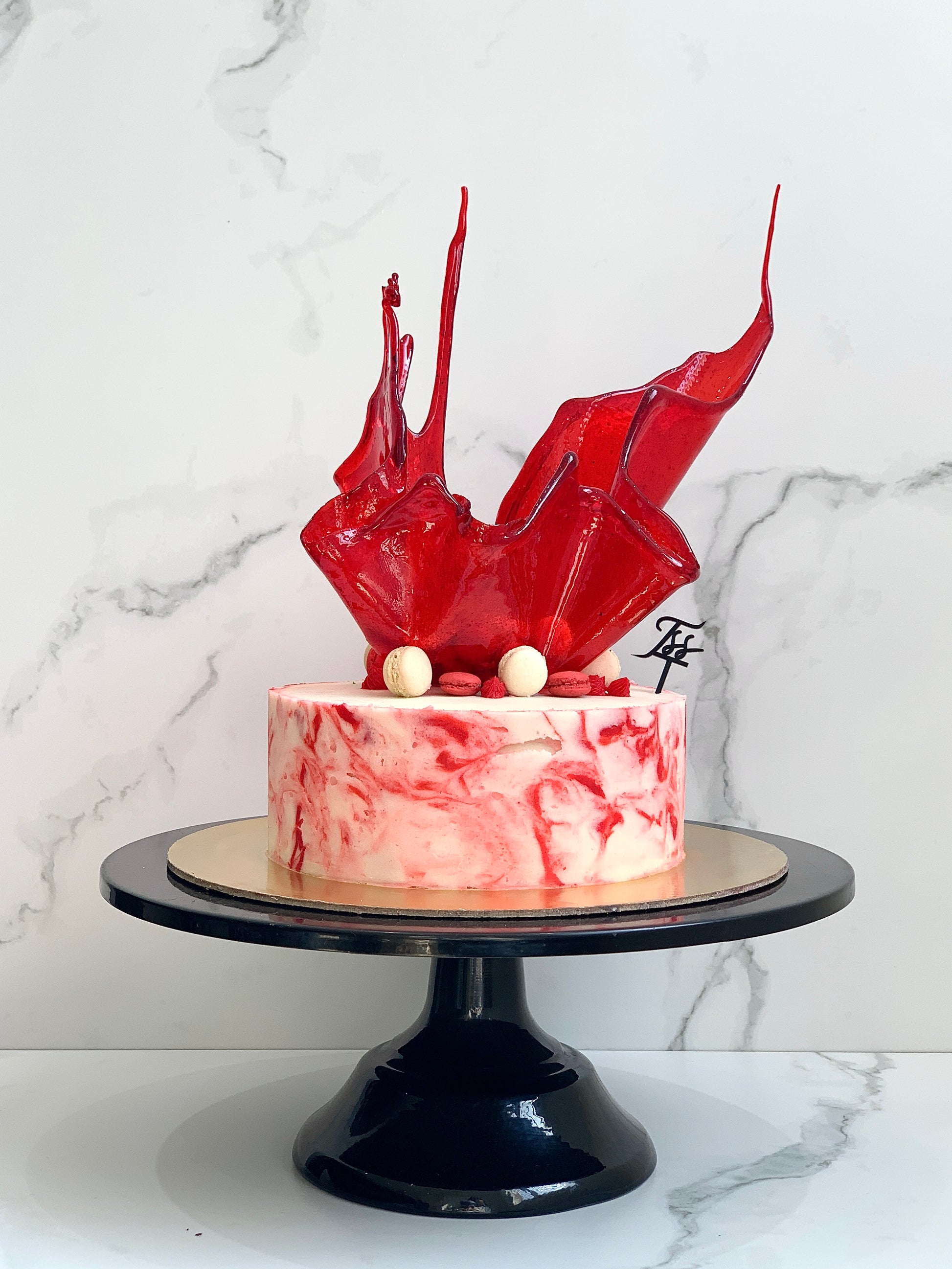 Isomalt cakes from The Sinful Spoon, close-up view showing translucent, sugar-like candy blocks for confectionery use.
