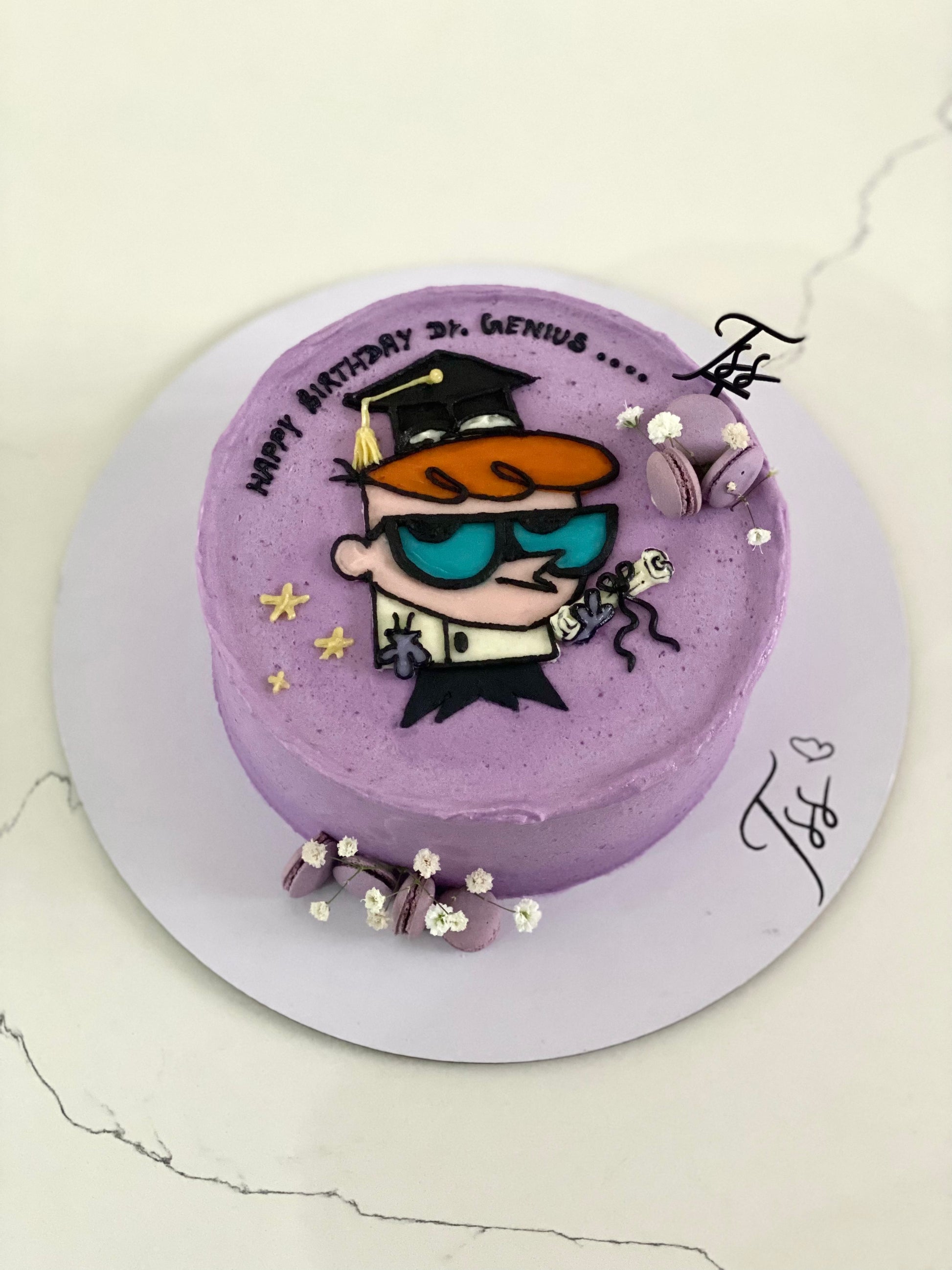 Colorful buttercream illustration cake by The Sinful Spoon with vibrant floral and decorative piping on a tiered cake.
