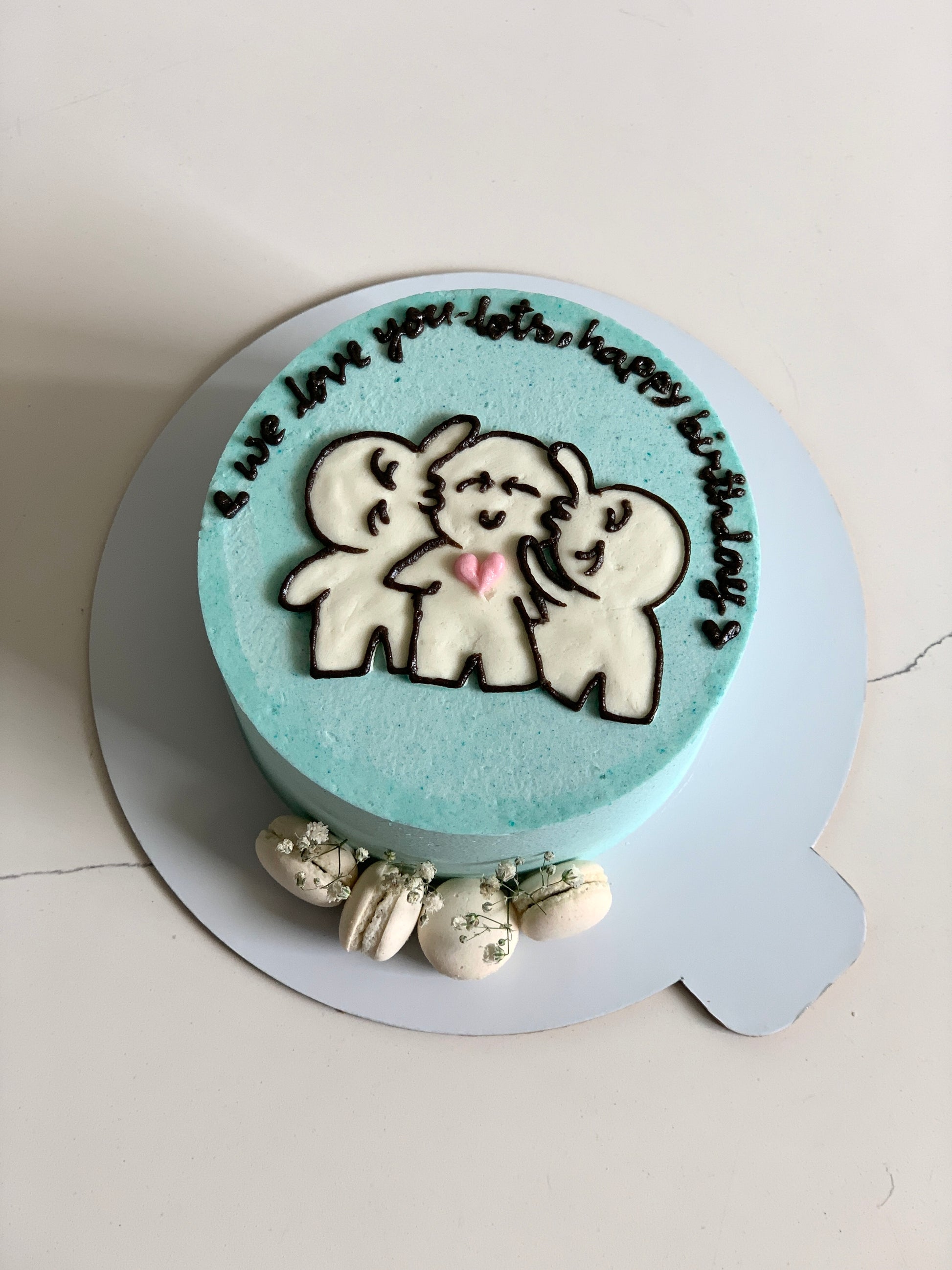 Buttercream illustration cake by The Sinful Spoon featuring colorful, detailed decorative frosting and artistic cake design.