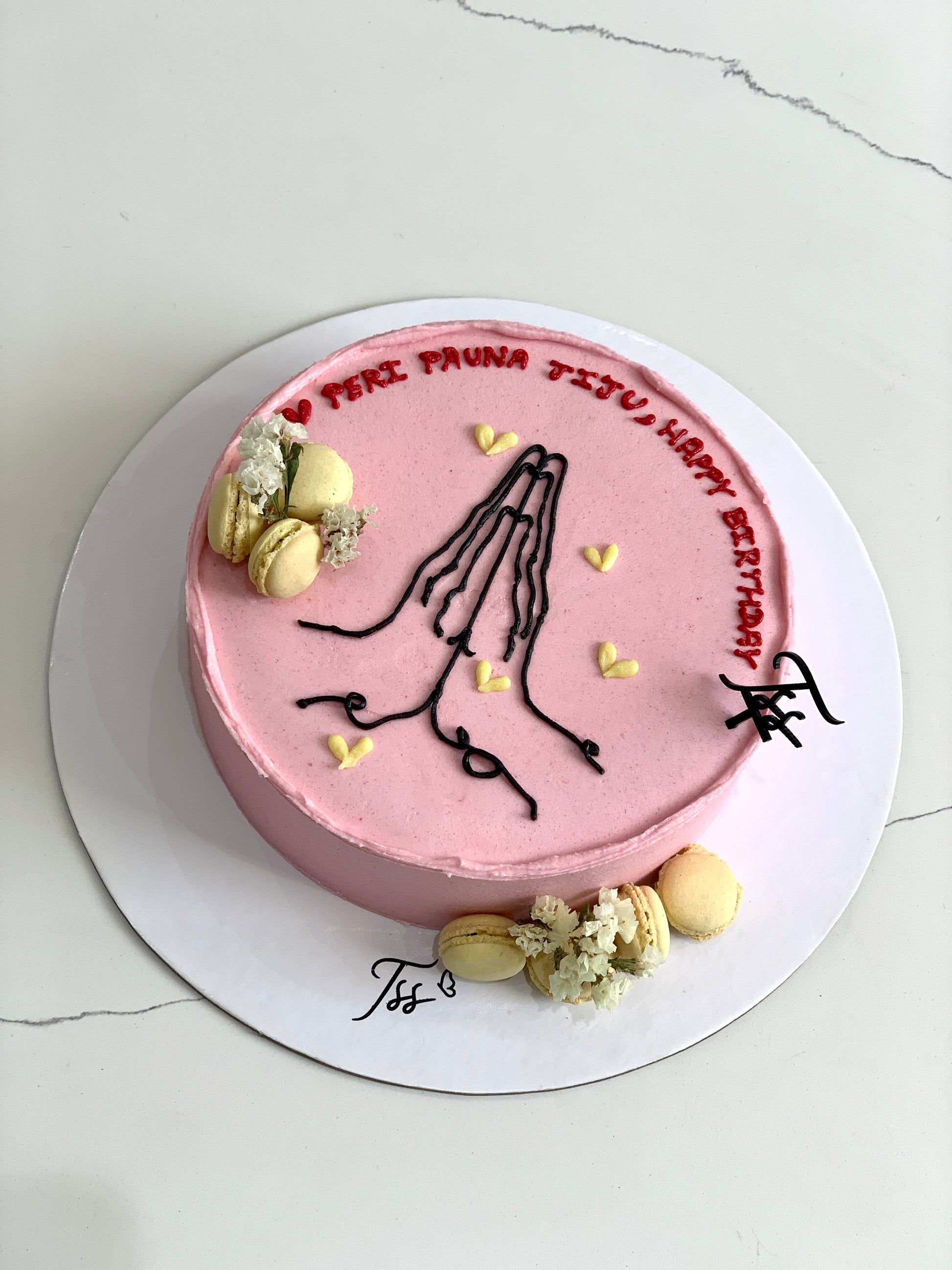 Decorative buttercream illustration cake by The Sinful Spoon, featuring intricate floral and artistic buttercream designs.