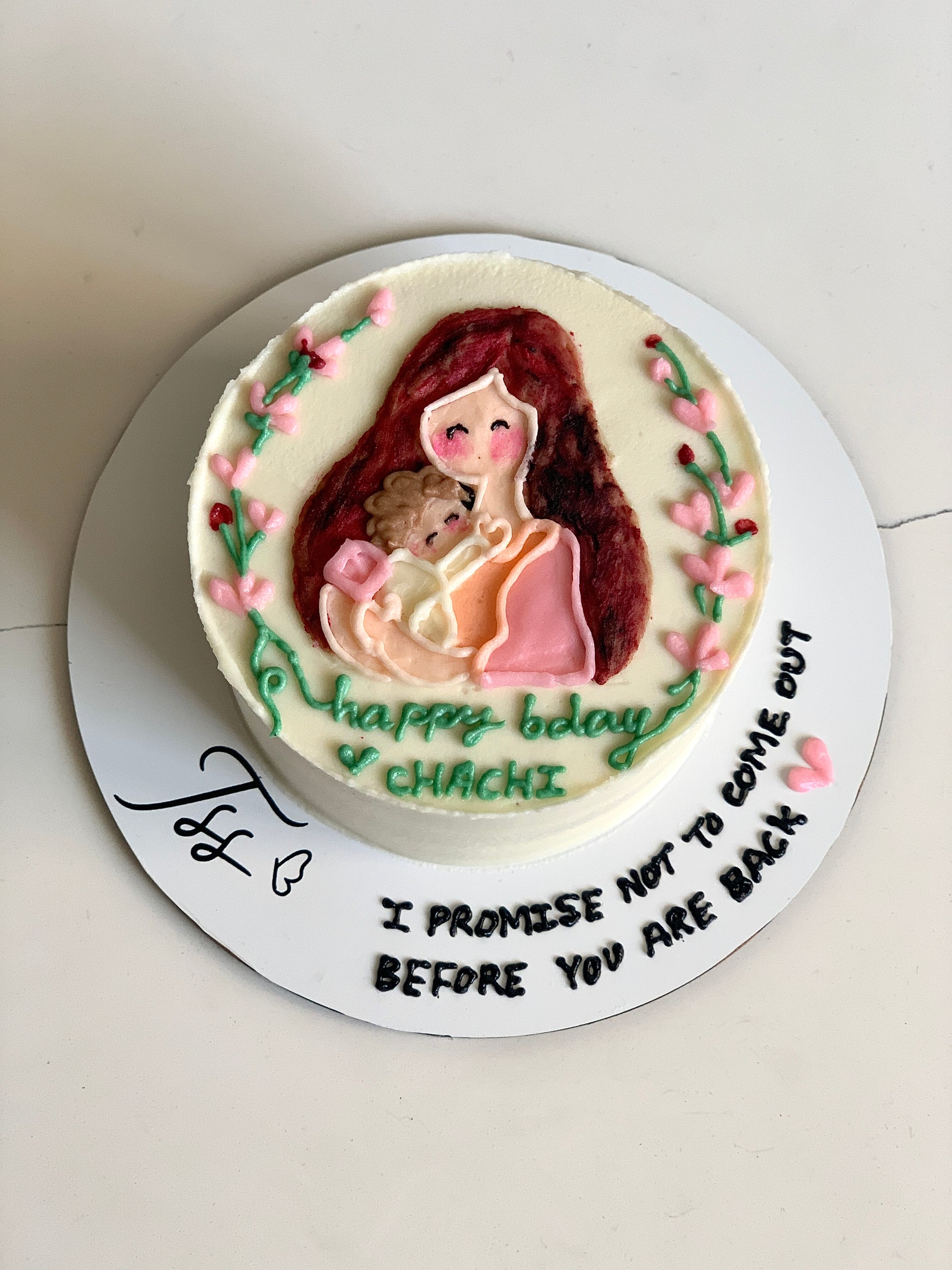 Decorative buttercream illustration cake by The Sinful Spoon with colorful floral and whimsical design elements.