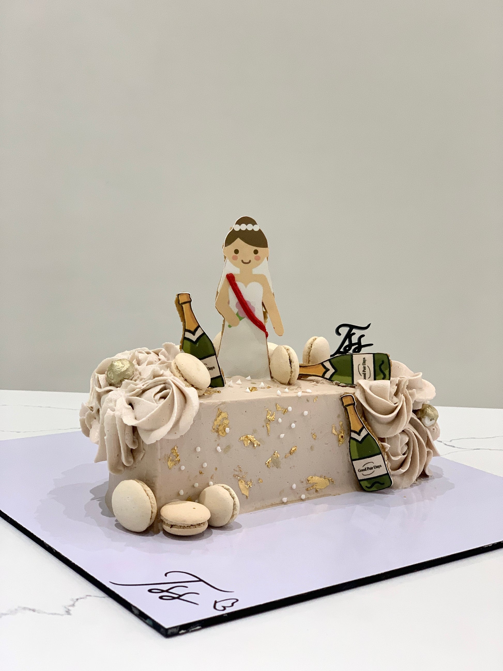 Half birthday cake from The Sinful Spoon with colorful frosting and festive decorations, perfect for celebrating milestones.