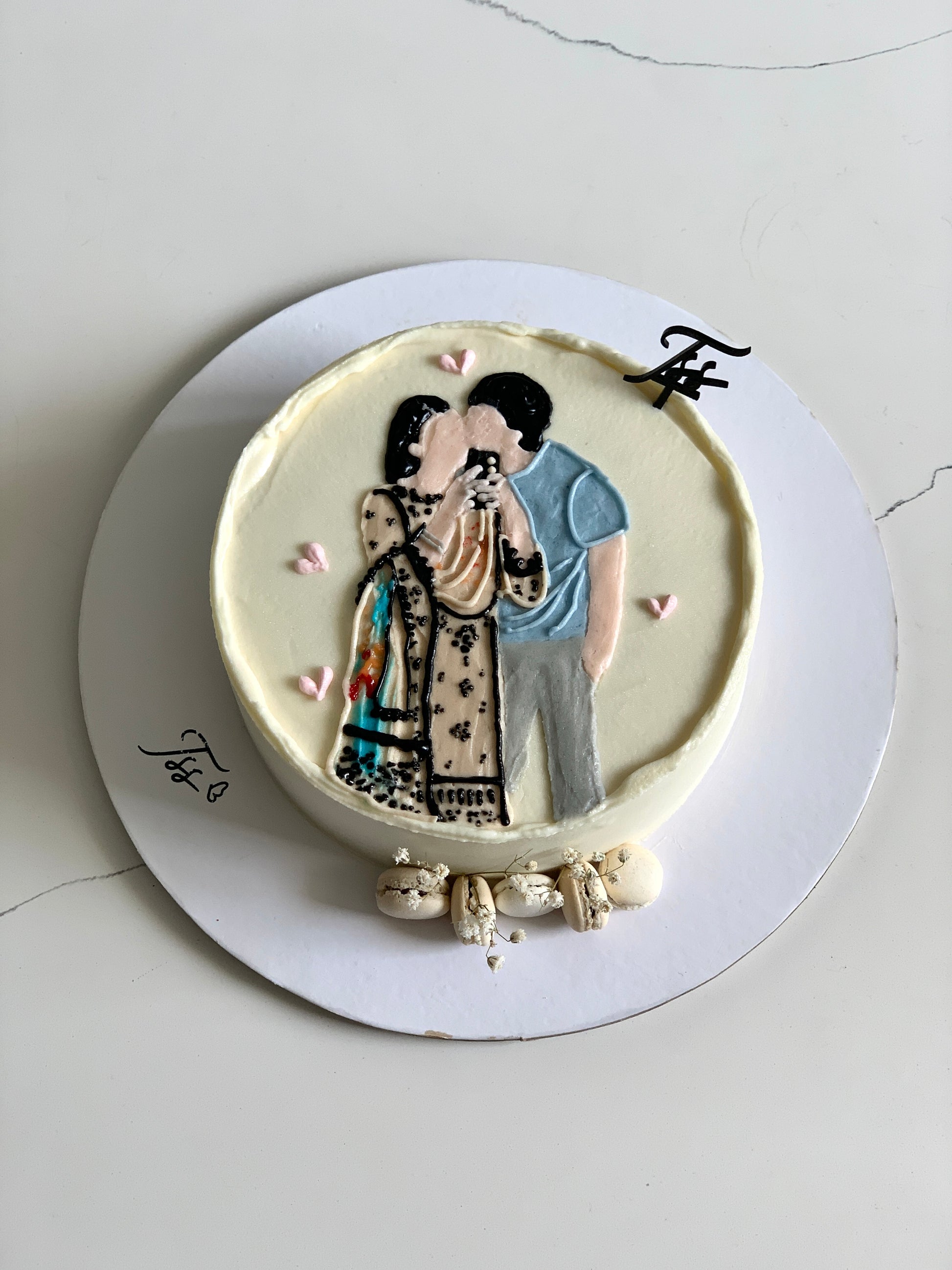 Decorative buttercream illustration cake by The Sinful Spoon with colorful floral and abstract piping details.
