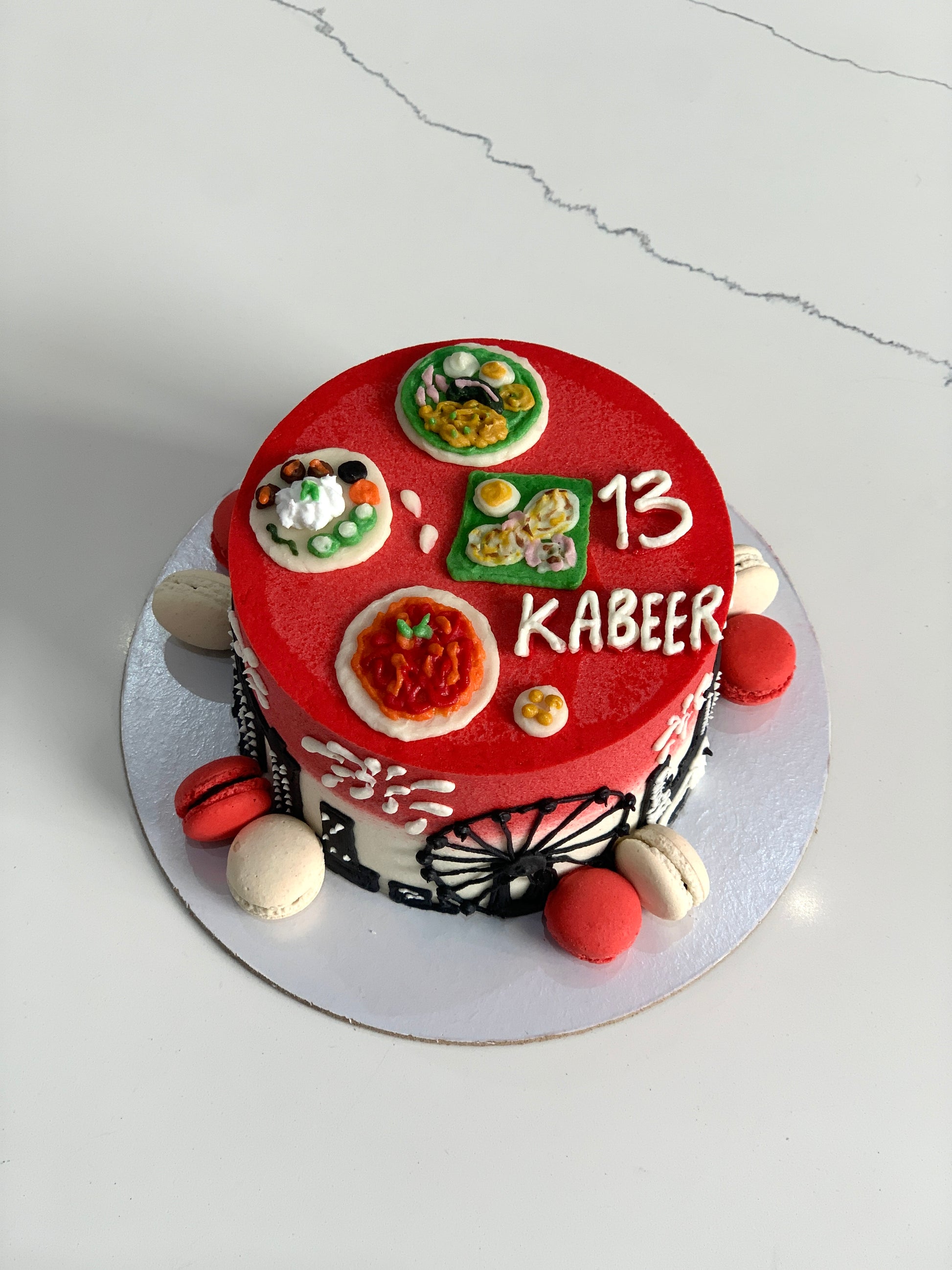 Decorative buttercream illustration cake by The Sinful Spoon featuring vibrant, detailed floral and abstract piping art.