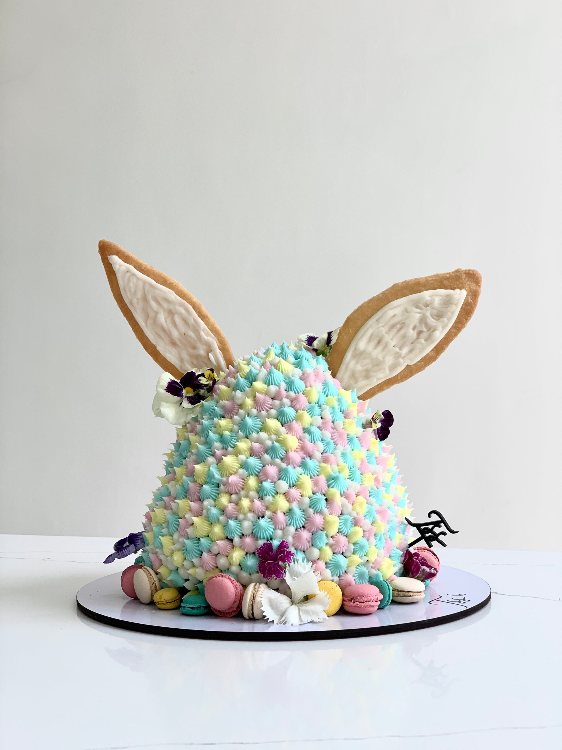 Shape cakes from The Sinful Spoon featuring colorful, decorative cake designs with intricate shapes for special occasions.