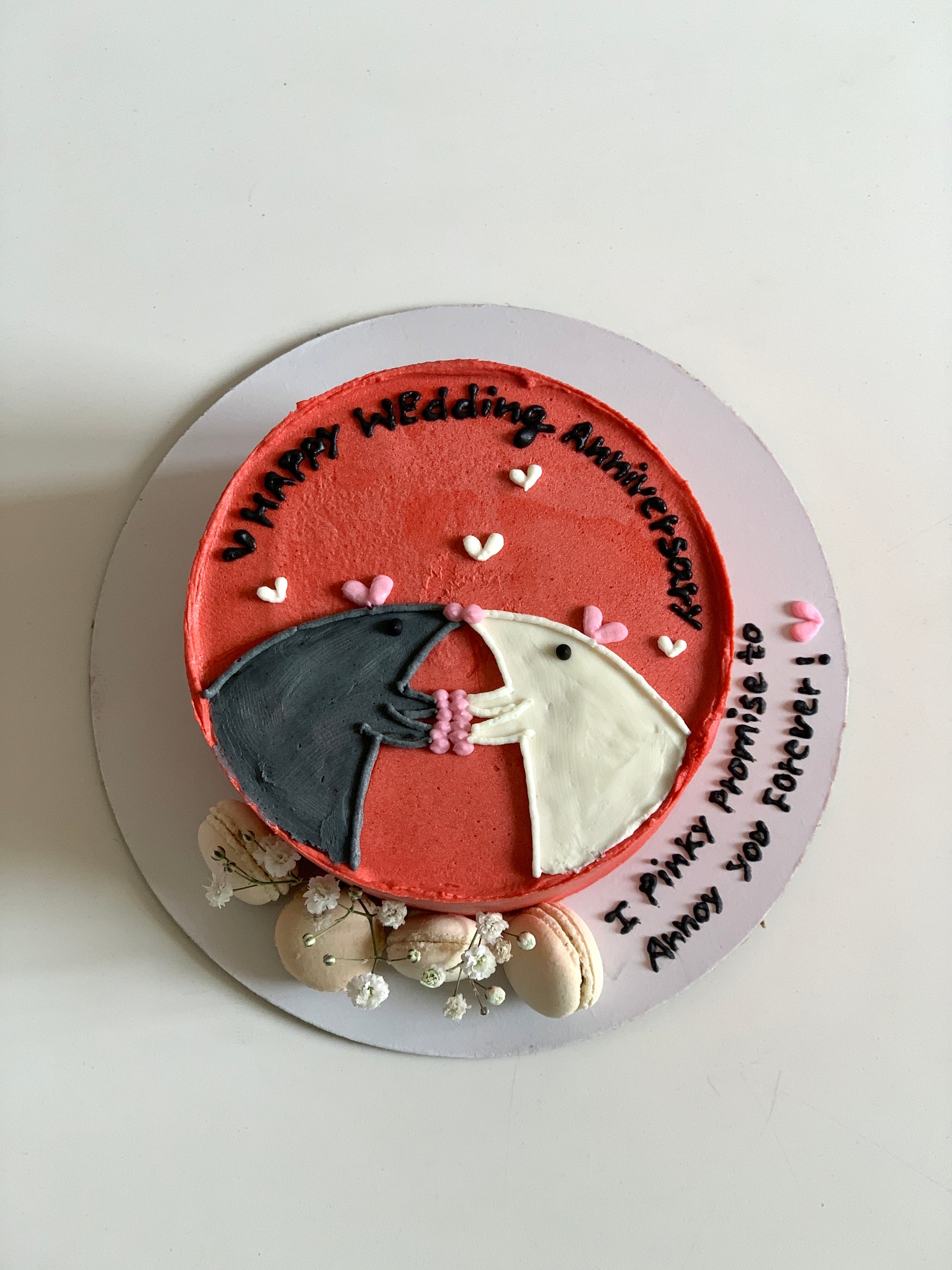 Decorative buttercream illustration cake by The Sinful Spoon featuring colorful floral and artistic piping details.