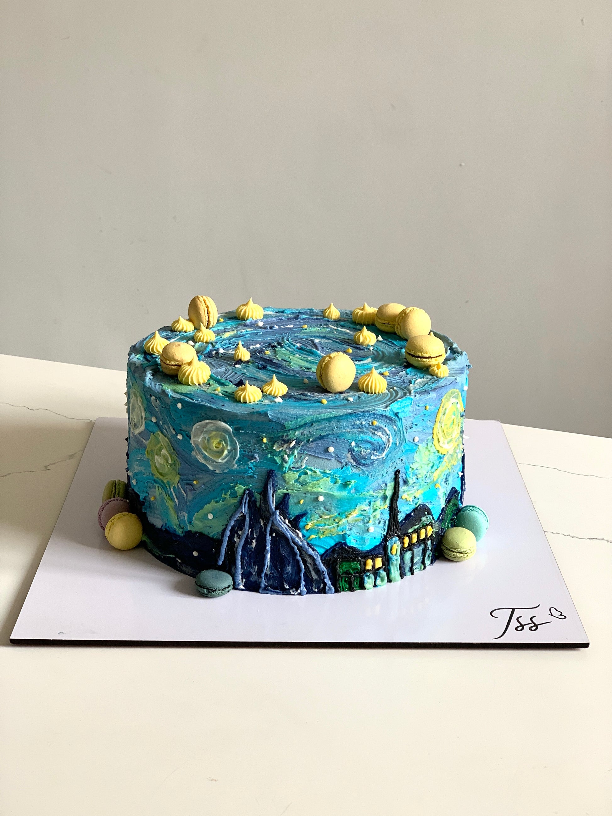 Decorative buttercream illustration cake by The Sinful Spoon featuring colorful floral and artistic piping details.