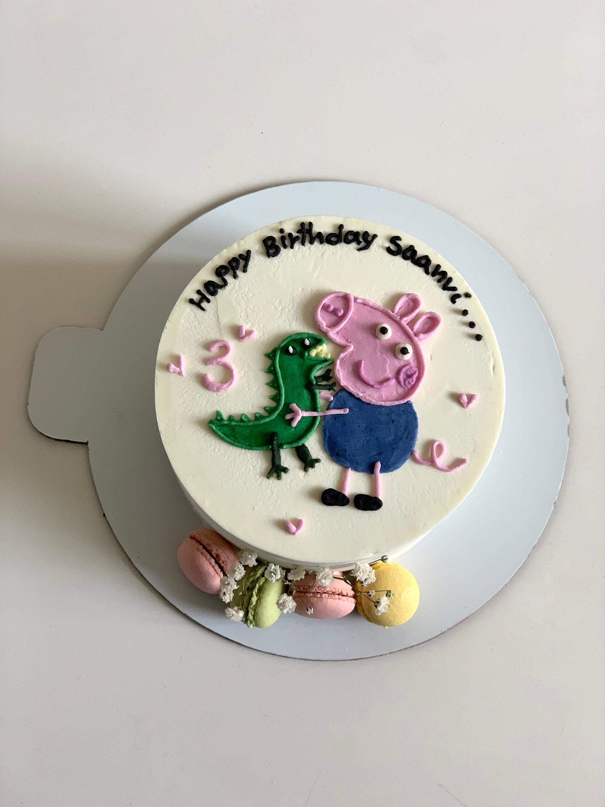 Colorful buttercream illustration cake by The Sinful Spoon with vibrant floral and decorative piping details.