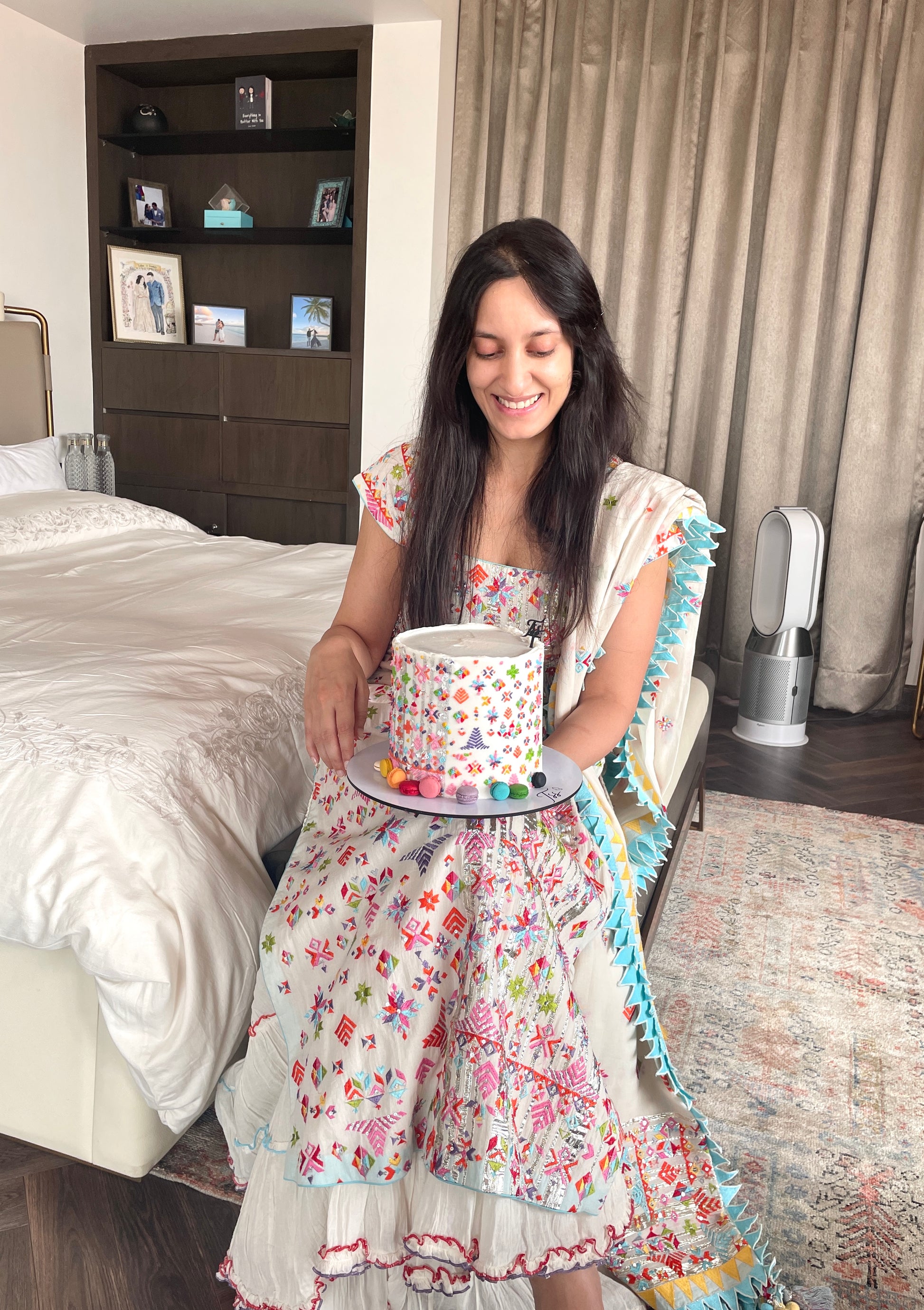 Decorative fashion cake by The Sinful Spoon featuring vibrant colors and intricate design, perfect for celebration and special occasions.
