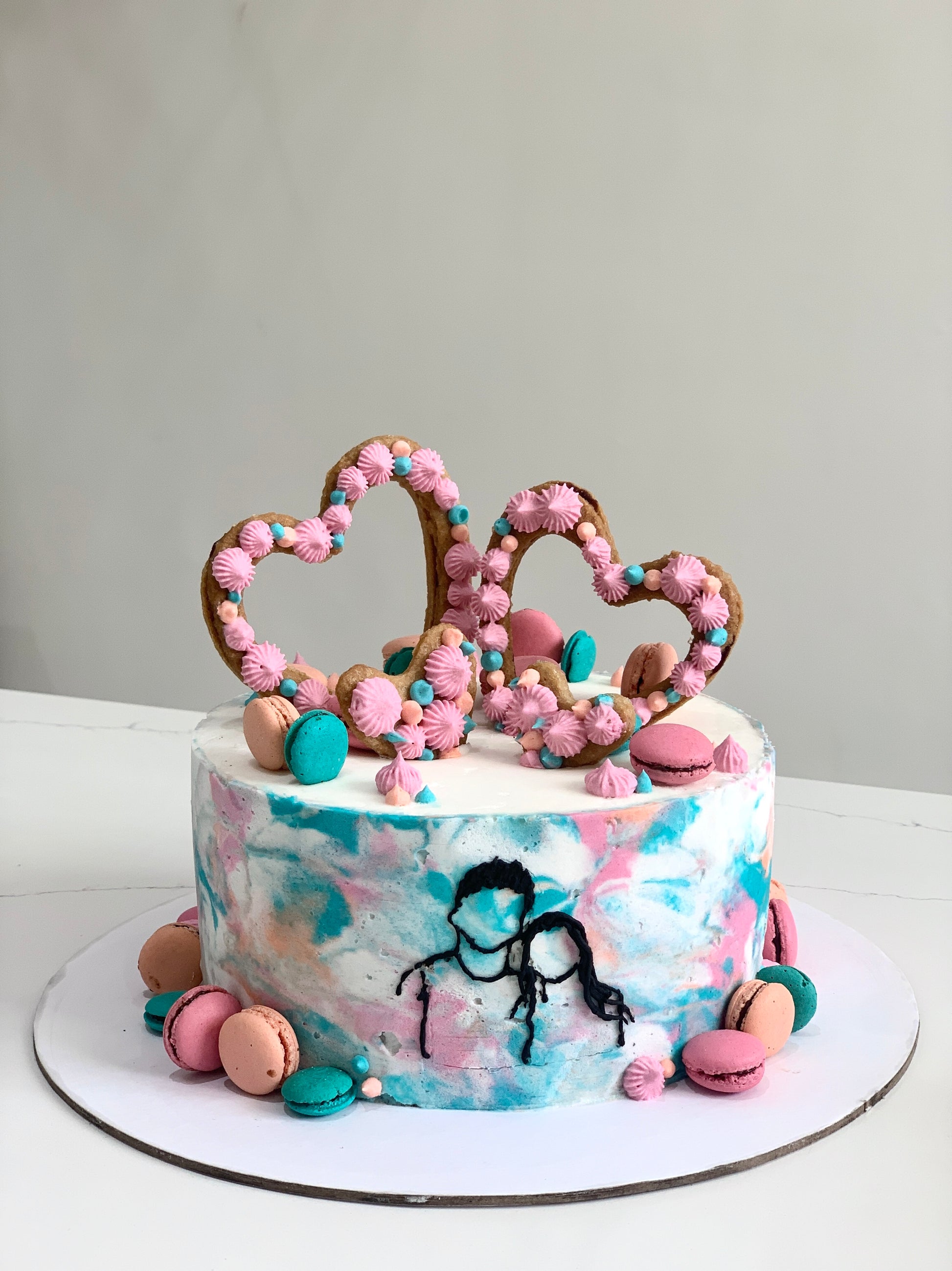 Classic Cakes from The Sinful Spoon displayed on a plate with frosting and decorative toppings, showcasing their rich texture and appealing design.