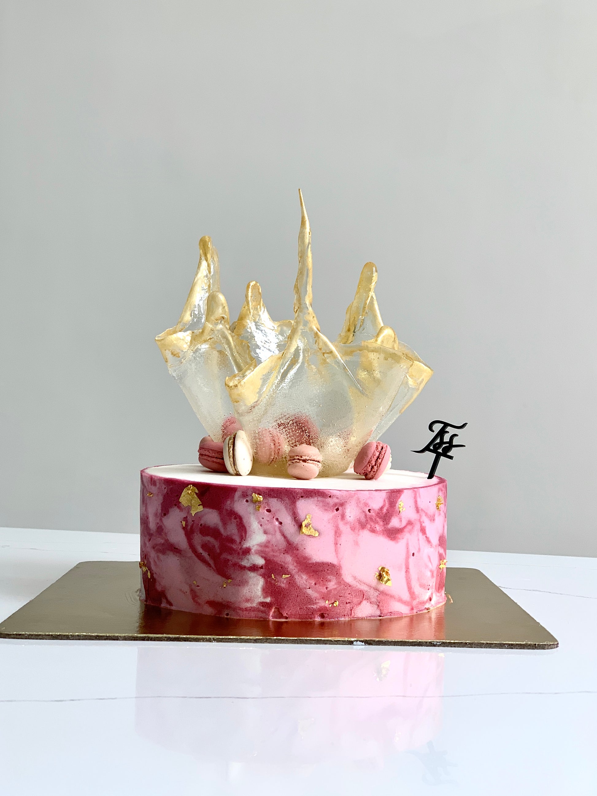 Isomalt cakes from The Sinful Spoon, colorful sugar sculptures for confectionery and cake decorating.