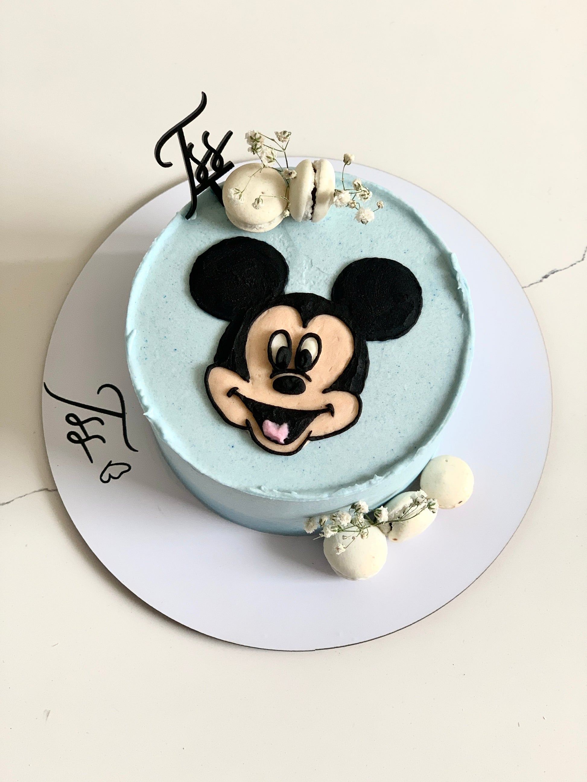 Buttercream illustration cake by The Sinful Spoon featuring colorful, detailed decorative frosting and artistic edible designs