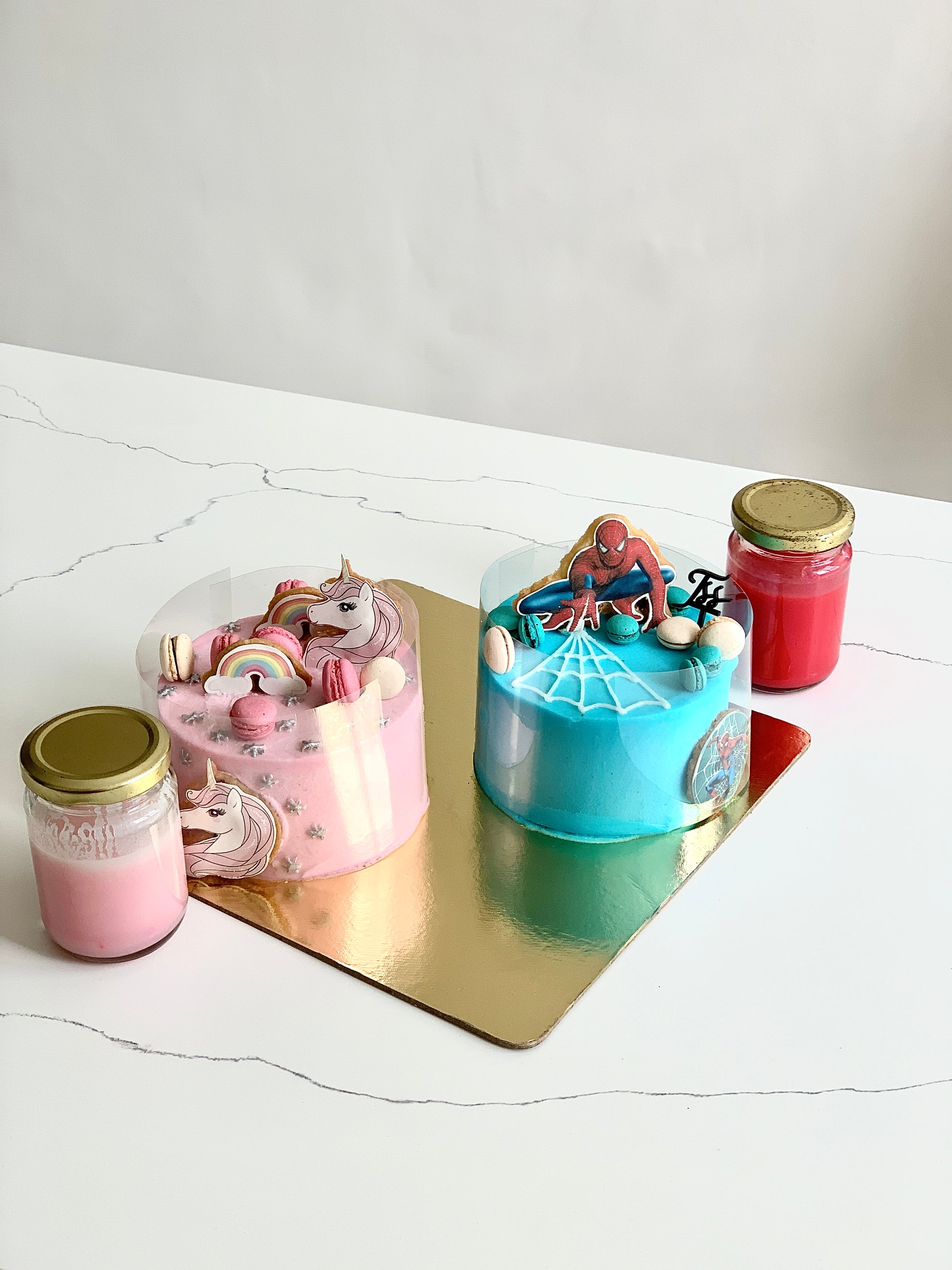 Edible paper cake topper for baby girl celebration from The Sinful Spoon, featuring delicate pink and white designs.