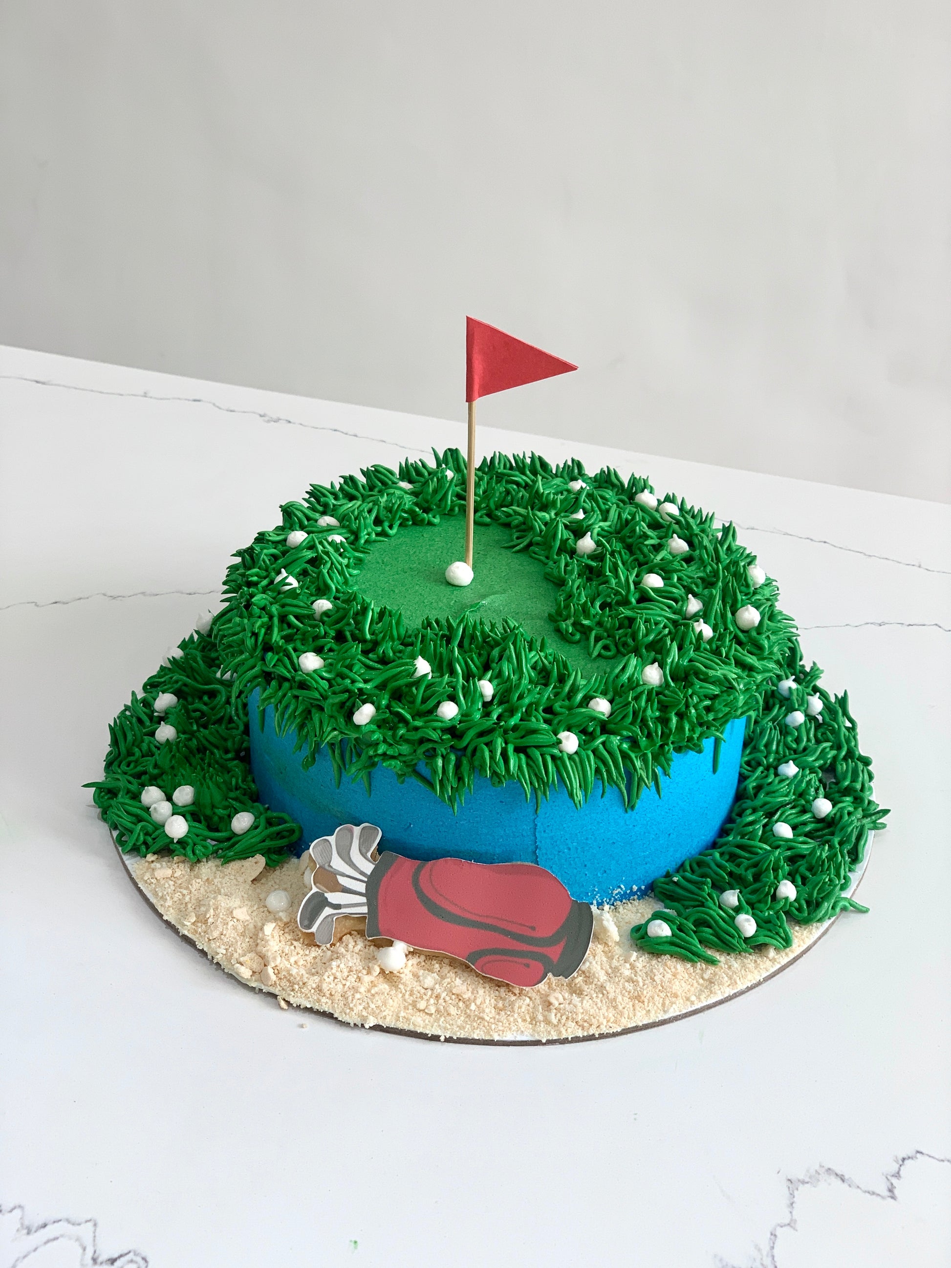 Edible paper cakes from The Sinful Spoon featuring colorful, decorative cake designs on a white background.