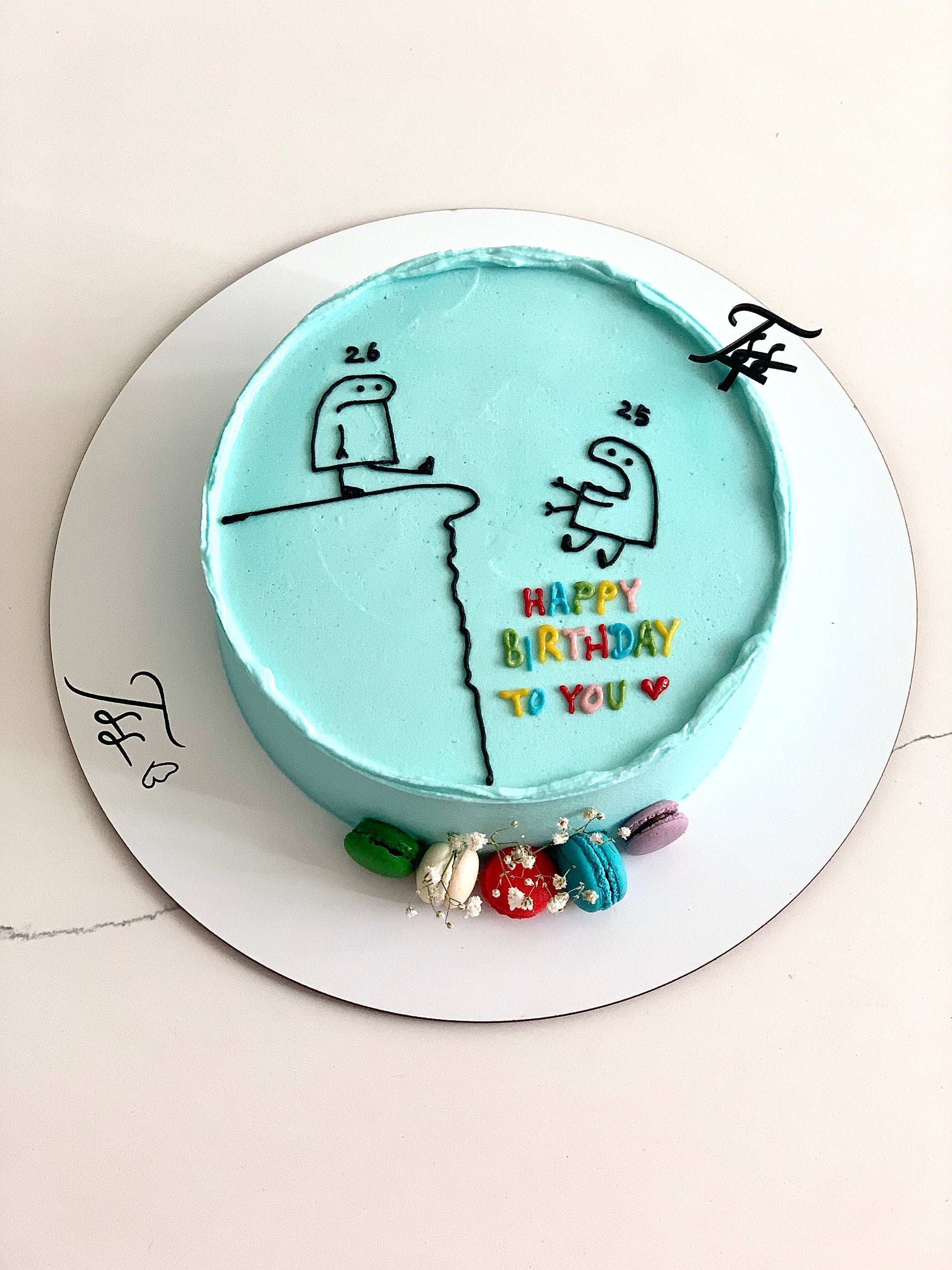 Colorful buttercream illustration cake by The Sinful Spoon featuring vibrant piping and detailed decorative icing.