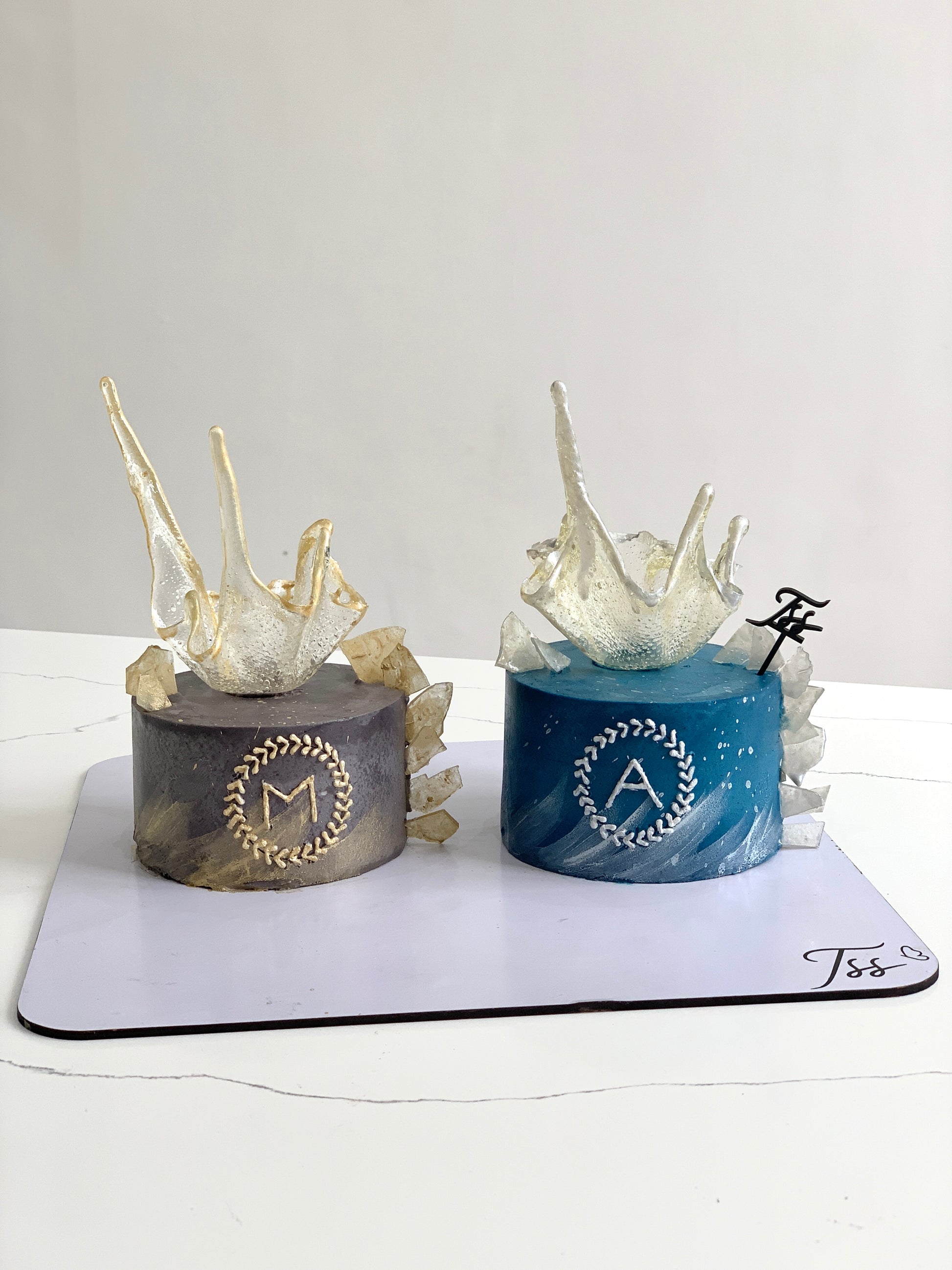 Isomalt cakes from The Sinful Spoon, colorful sugar art pieces used for confectionery decorations.