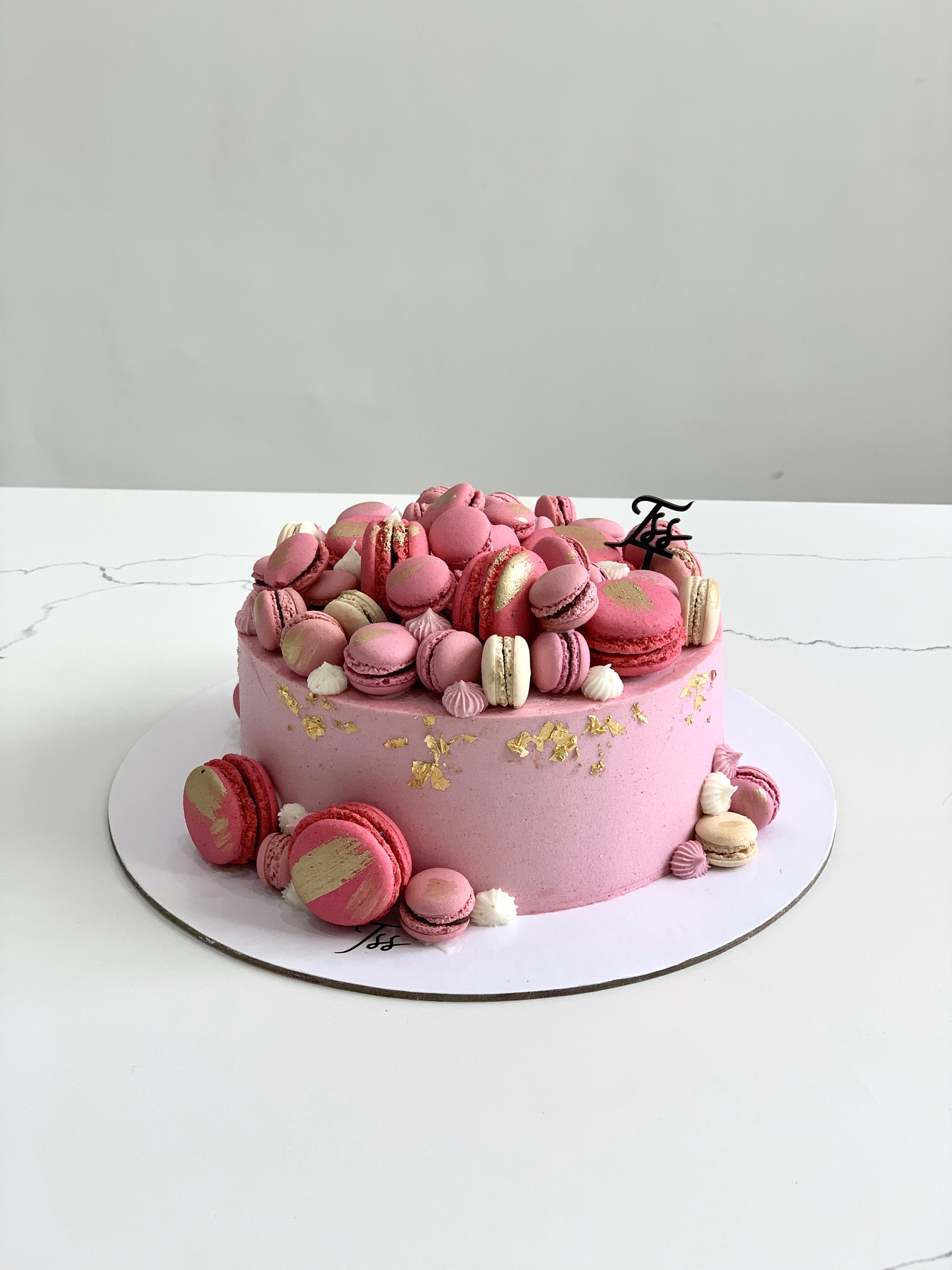 Freshly sliced classic cakes from The Sinful Spoon, showcasing their moist texture and rich, inviting flavors.