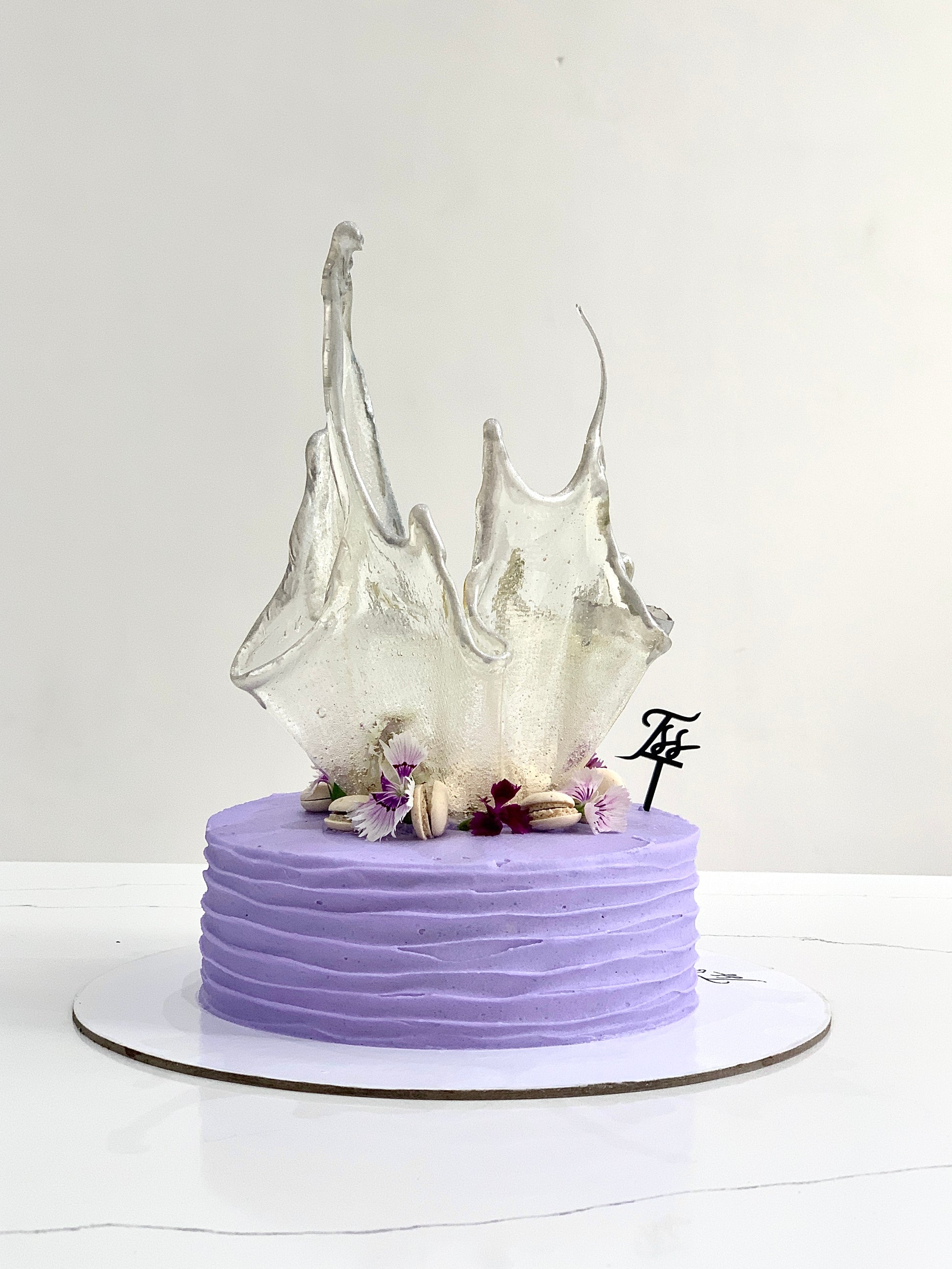 Isomalt cakes from The Sinful Spoon, colorful sugar art pieces for confectionery decorating and sugar craft projects.