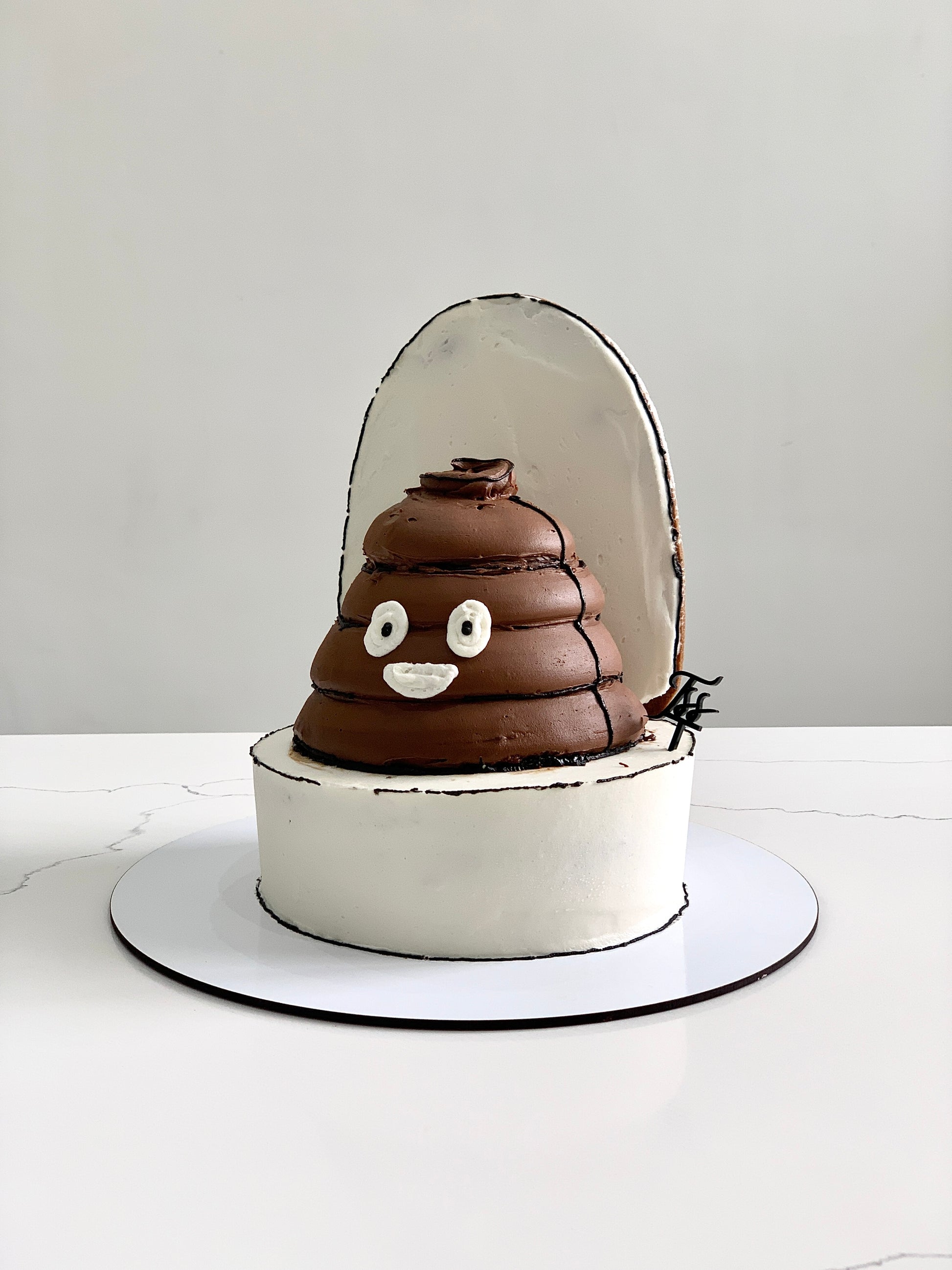 Decorative shape cakes from The Sinful Spoon featuring colorful, intricate designs suitable for special occasions.