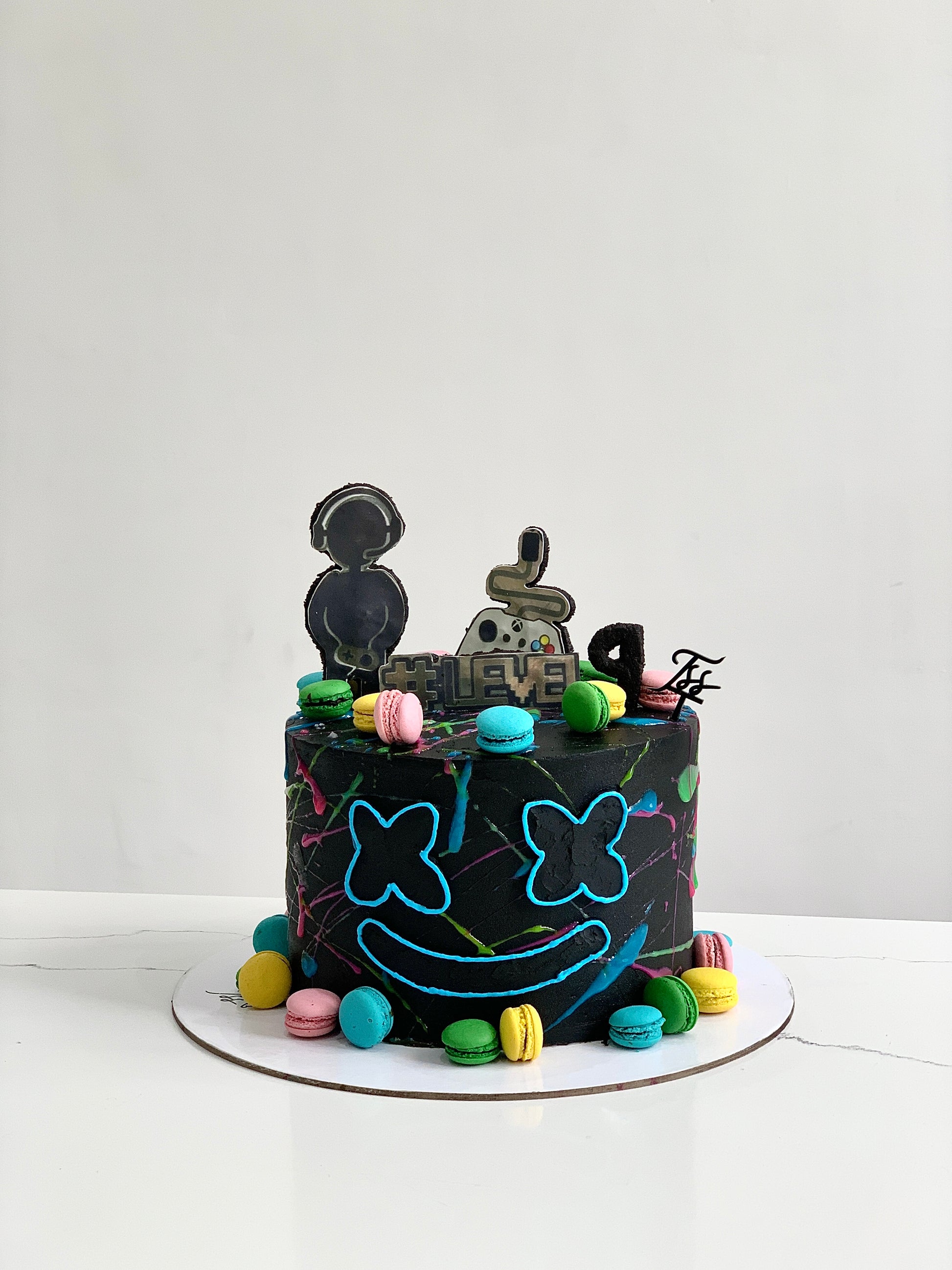 Edible paper cake topper for baby boy celebration by The Sinful Spoon, featuring a detailed edible paper design on a cake.