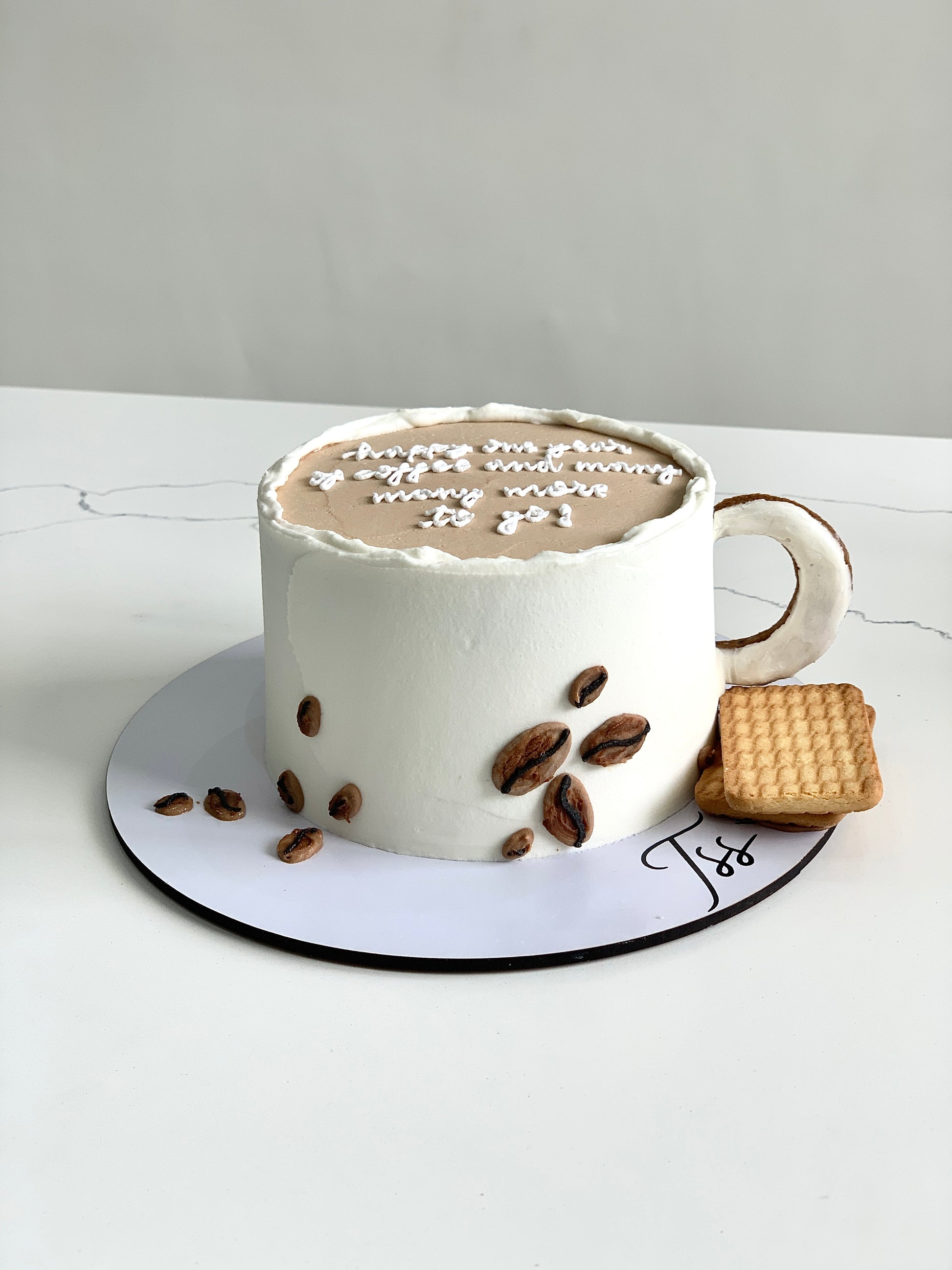 The Sinful Spoon shape cupcake or mug cake in a decorative container with colorful toppings and a playful presentation.