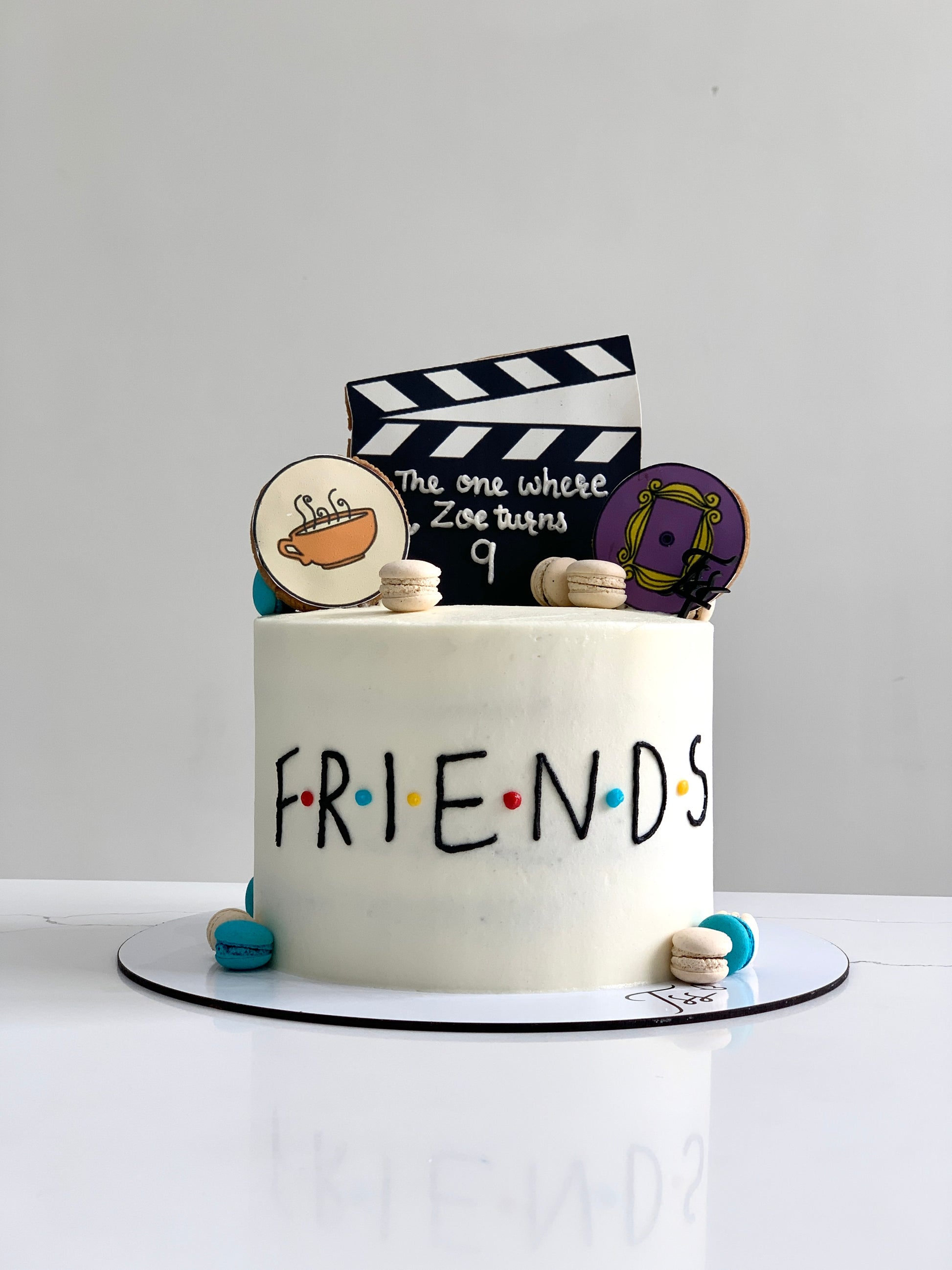 Colorful edible paper cakes by The Sinful Spoon, featuring vibrant decorative layers and intricate edible designs.