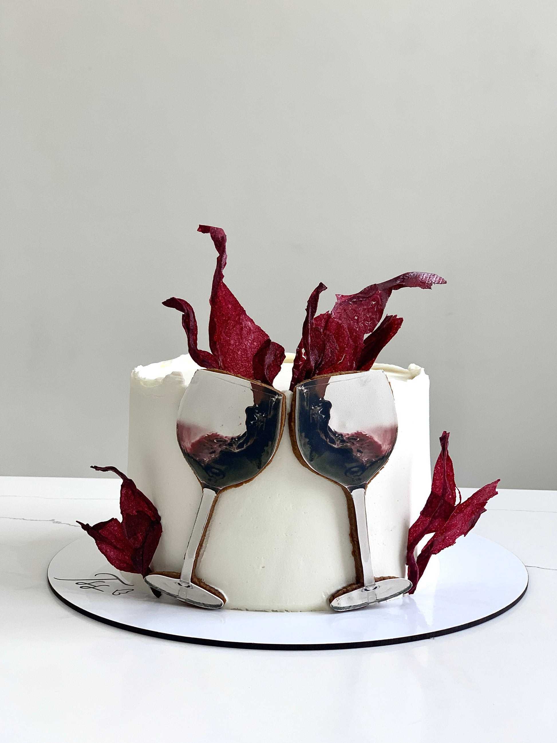 Edible paper cakes from The Sinful Spoon featuring colorful, detailed designs on thin, decorative edible paper for cake decoration