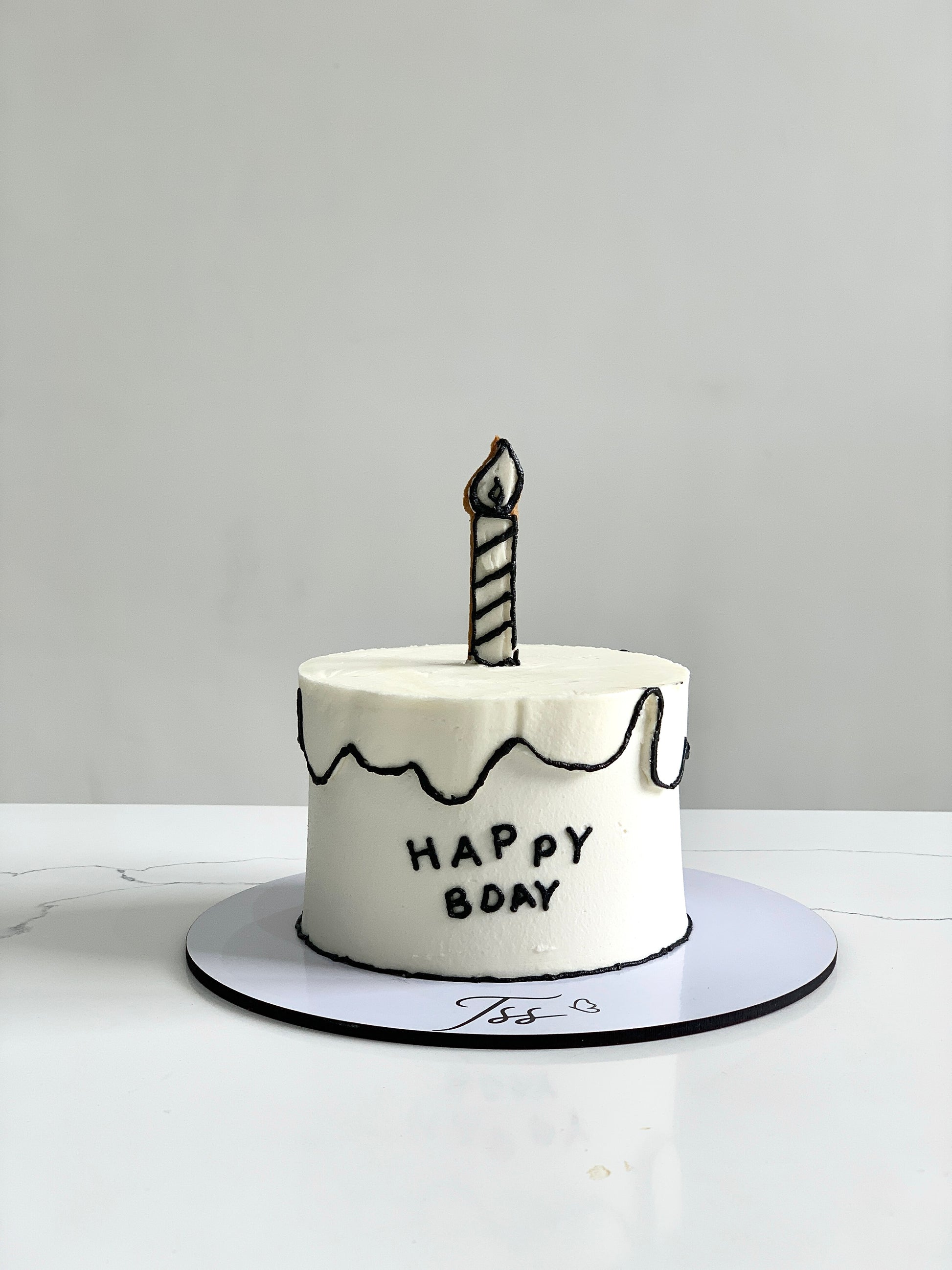 Colorful comic-themed cakes by The Sinful Spoon with vibrant icing and fun, detailed cartoon designs.