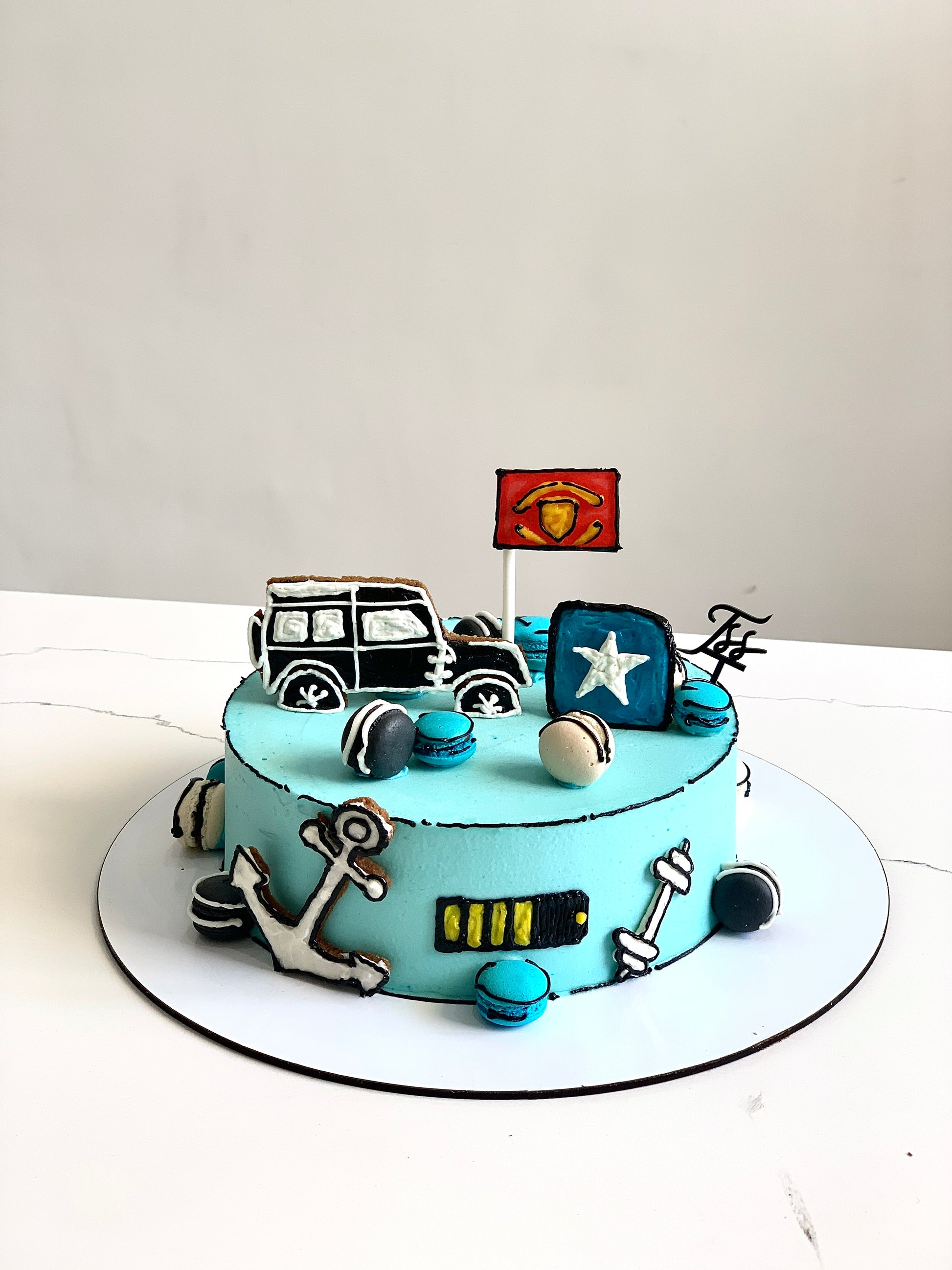 Colorful comic-themed cakes by The Sinful Spoon, decorated with vibrant icing and fun comic book designs.