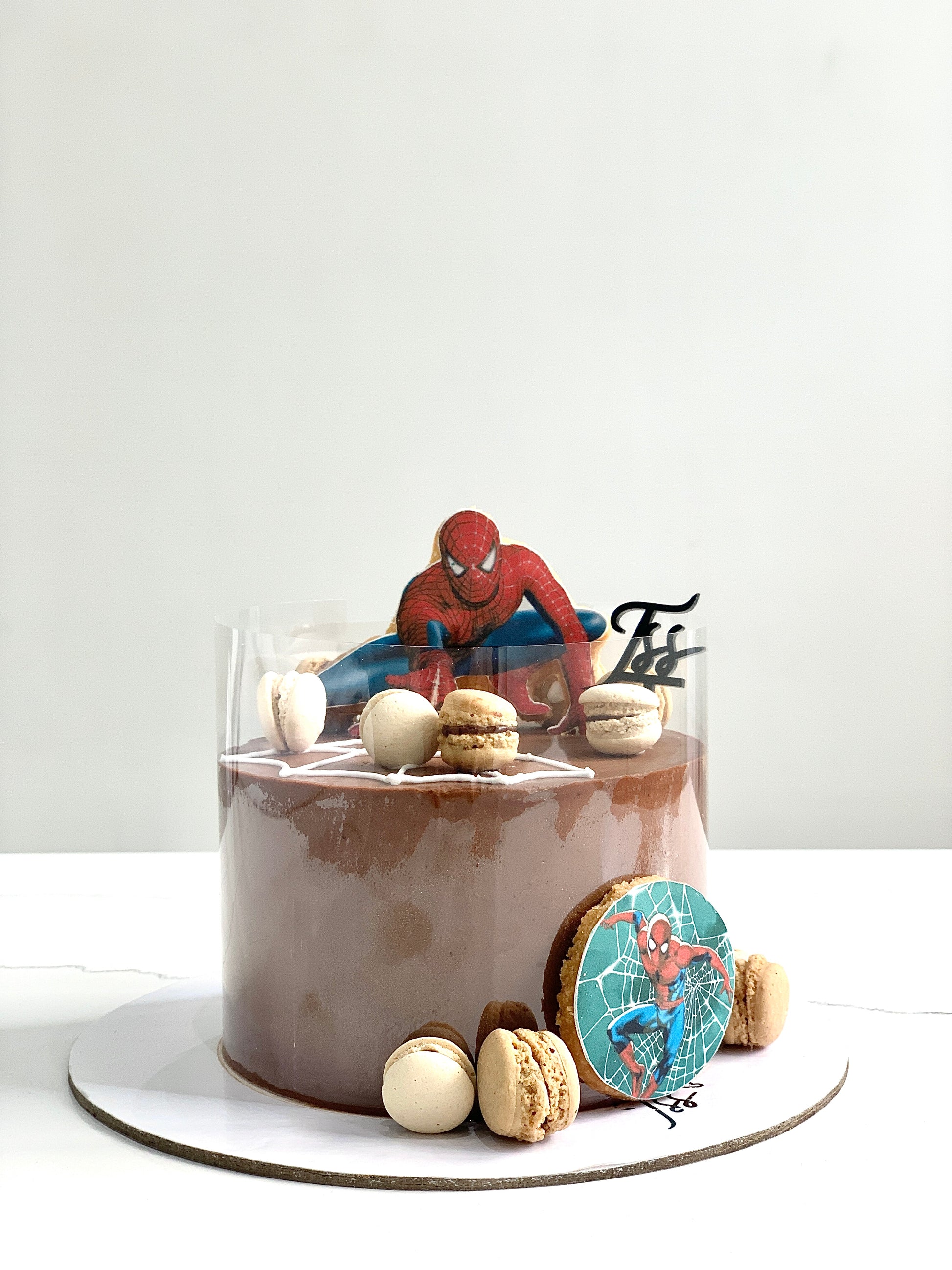 Edible paper cake featuring a baby boy design by The Sinful Spoon, decorative and suitable for baby shower celebrations.