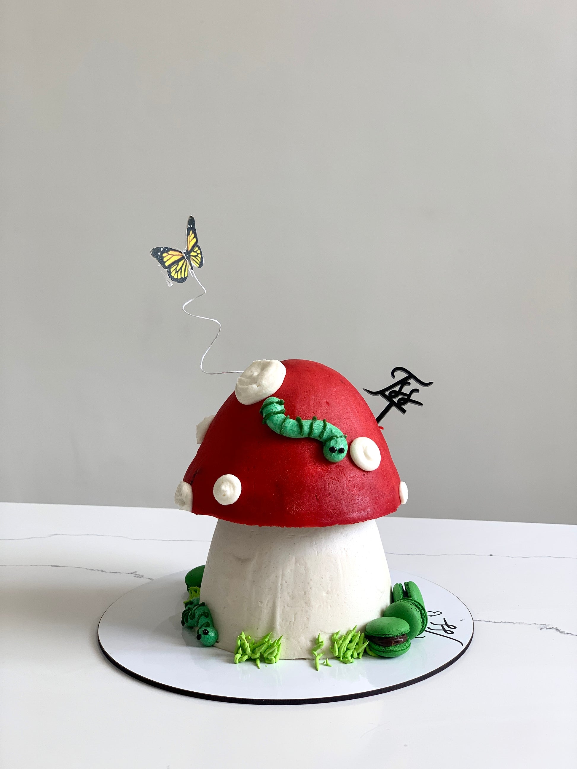 Colorful shape cakes from The Sinful Spoon with assorted fun designs and vibrant frosting, perfect for celebrations.