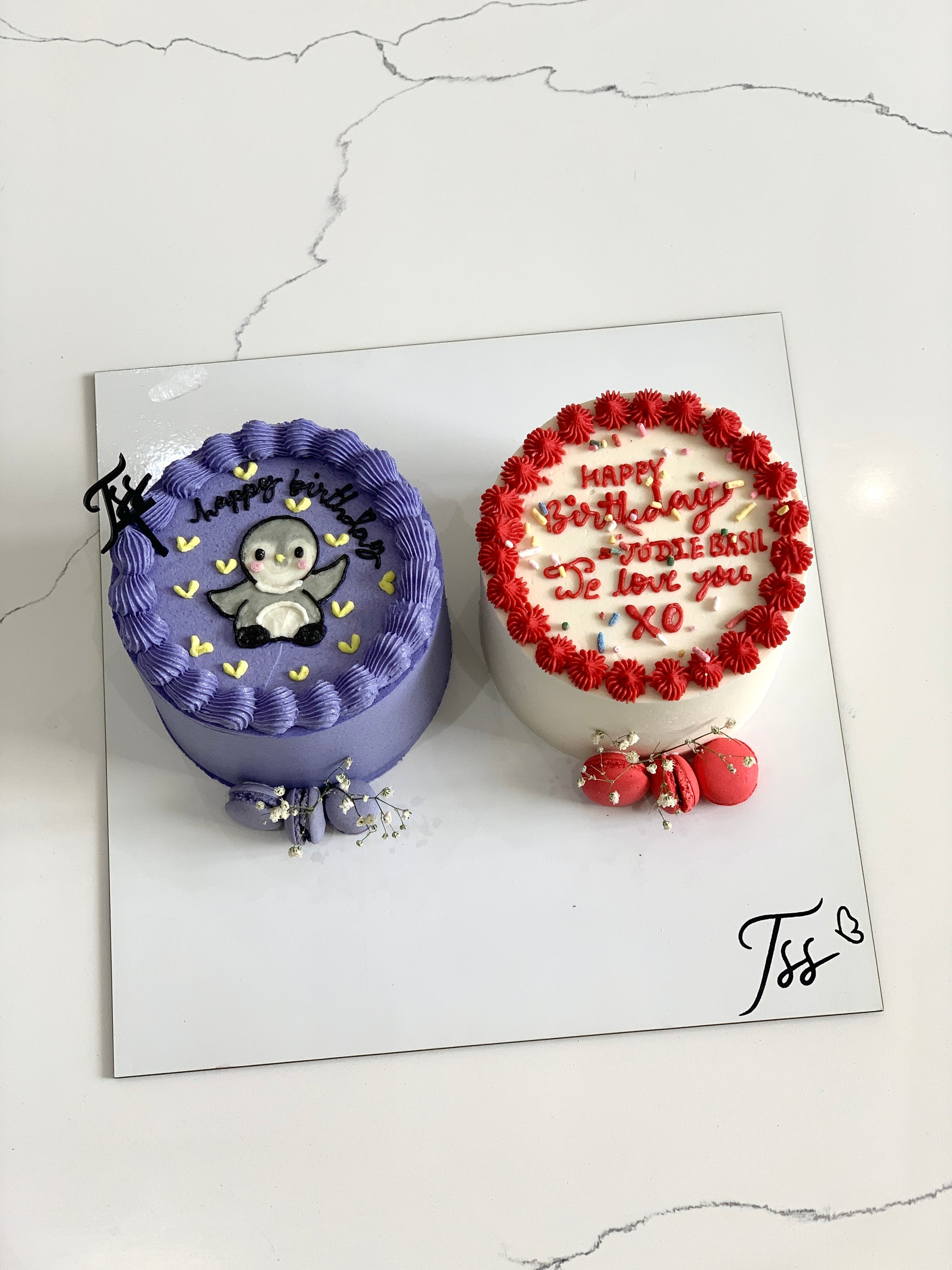Assorted combo cakes from The Sinful Spoon featuring layered and decorated desserts on a plate.