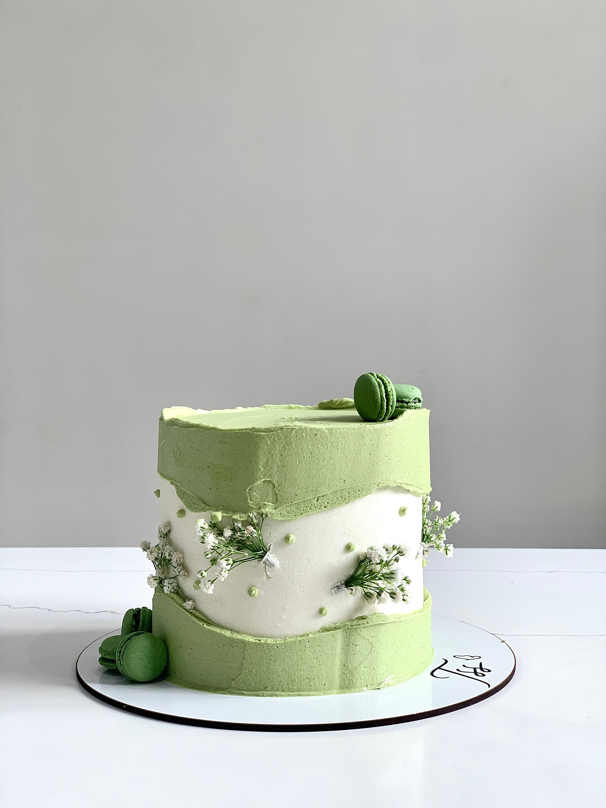 Fresh floral cakes by The Sinful Spoon featuring colorful, decorated cakes with vibrant flower designs and elegant presentation.