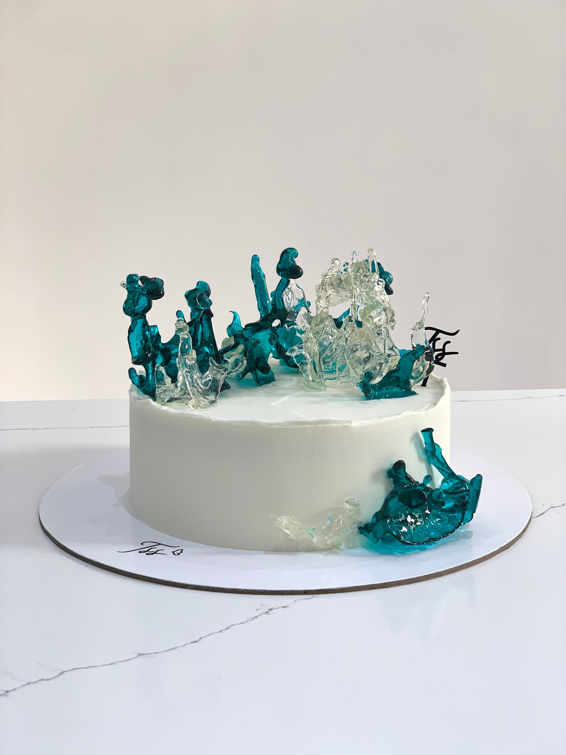 Isomalt cakes from The Sinful Spoon, clear, glossy sugar substitute blocks for confectionery and cake decorating.